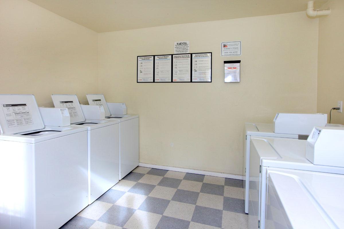 a white refrigerator freezer sitting in a room