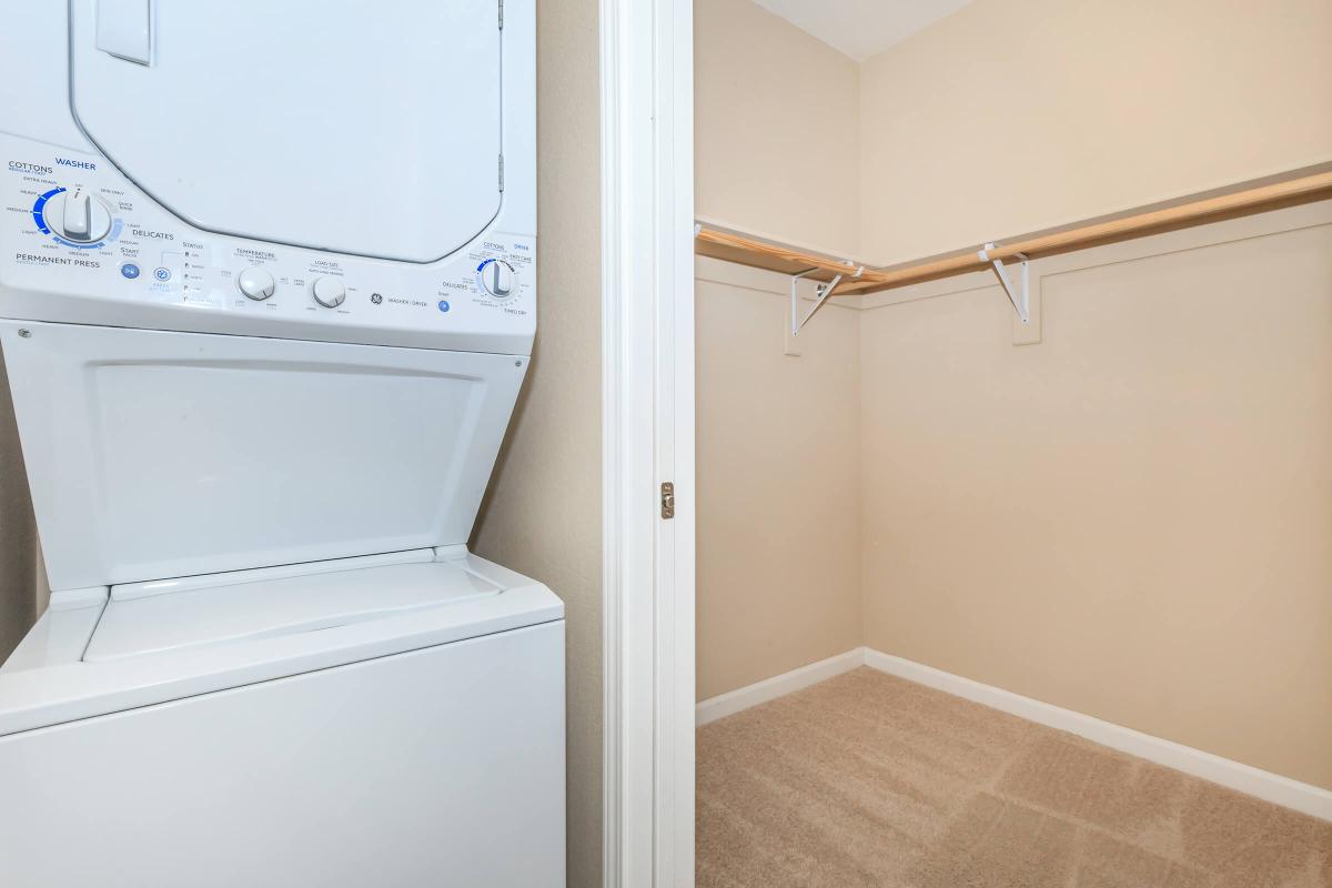 a white refrigerator freezer sitting in a room