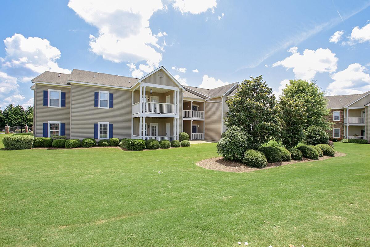 a large lawn in front of a house