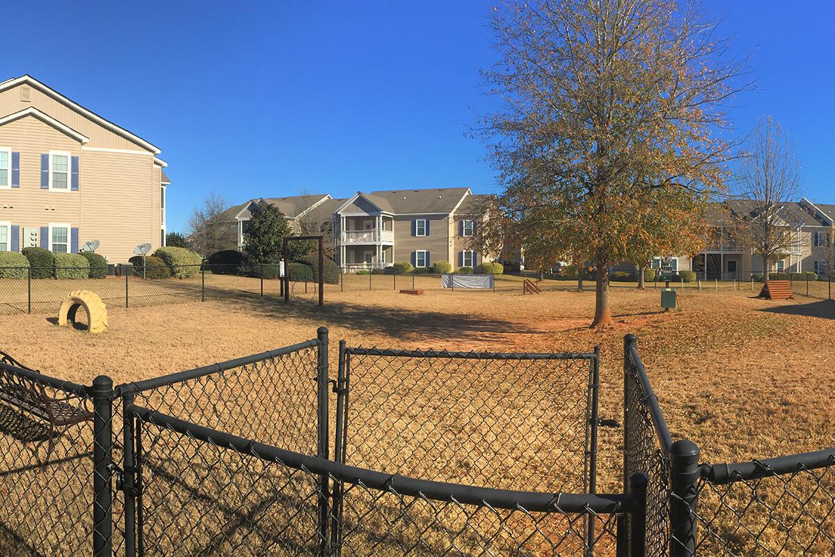 a building with a metal fence