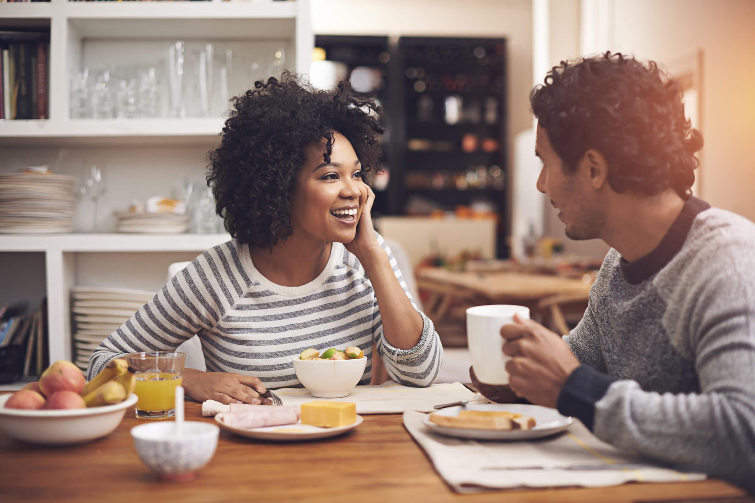 a man and a woman sitting at a table