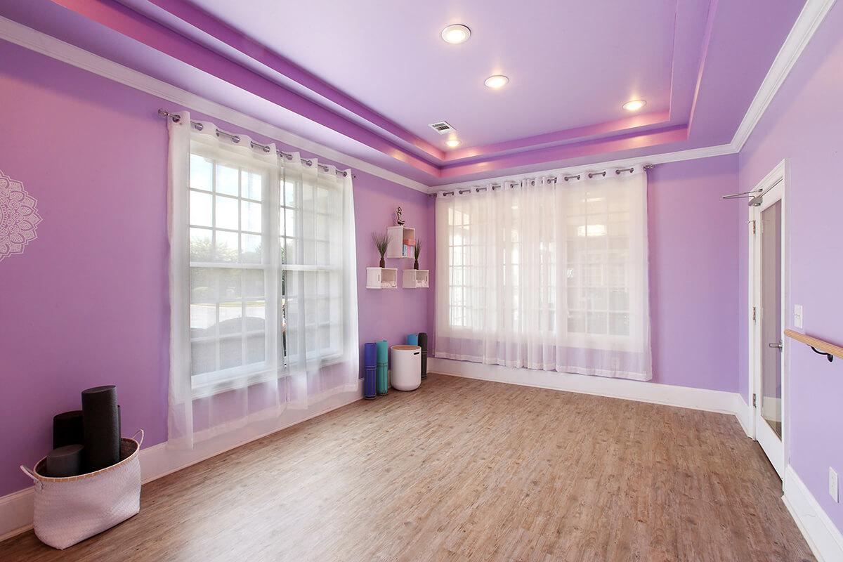 a bedroom with a large window