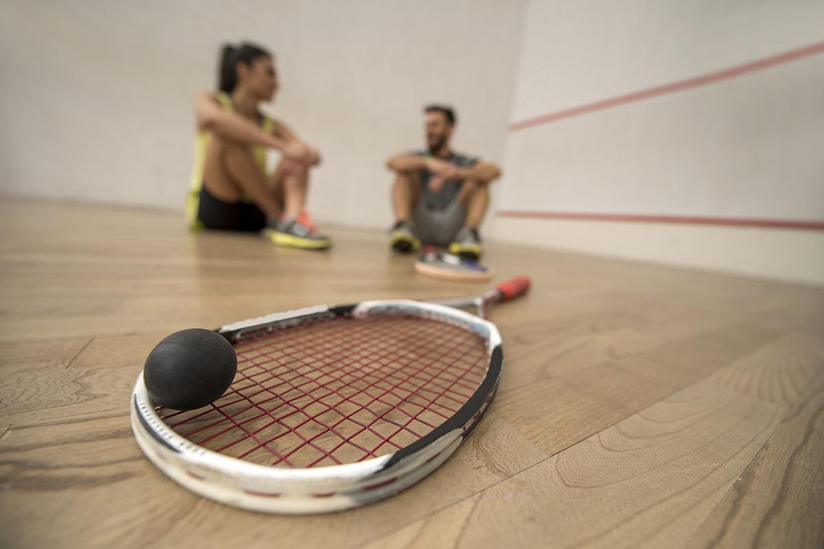 Close up of squash racket and a ball iStock_86260647_LARGE.jpg