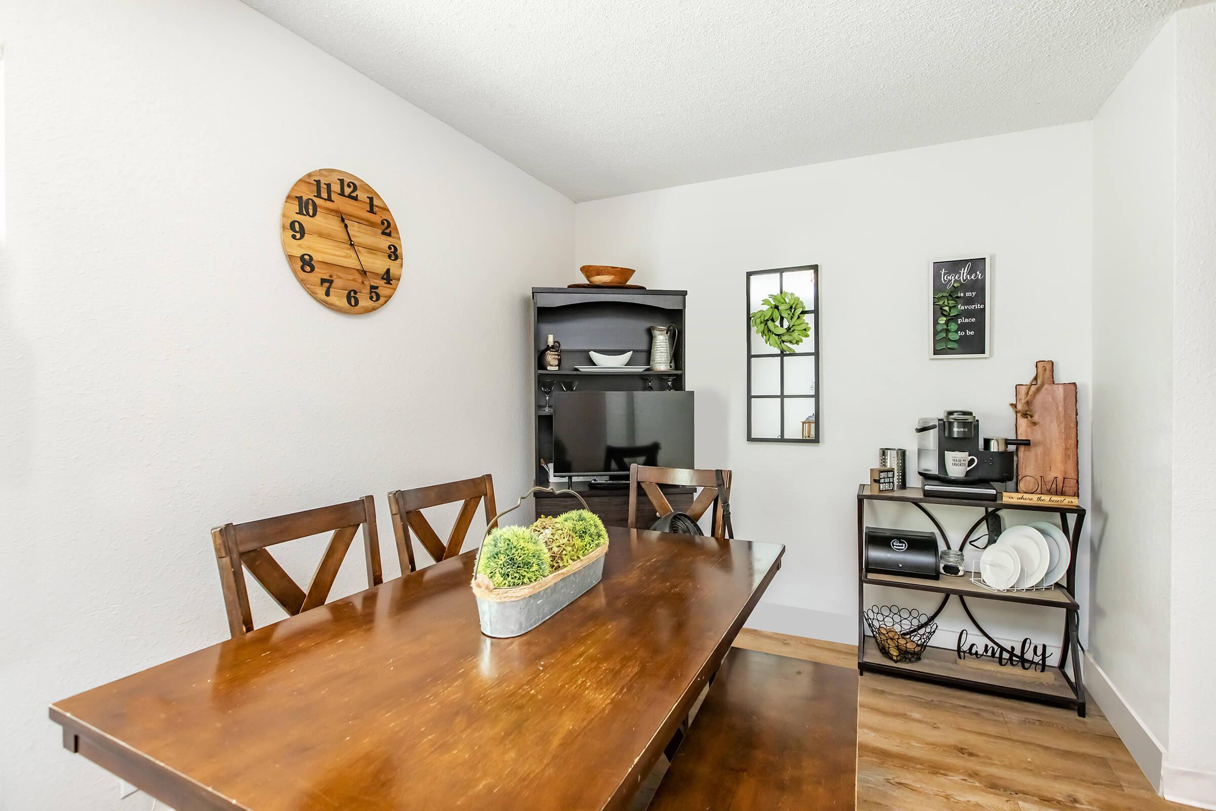 a kitchen with a table in a room