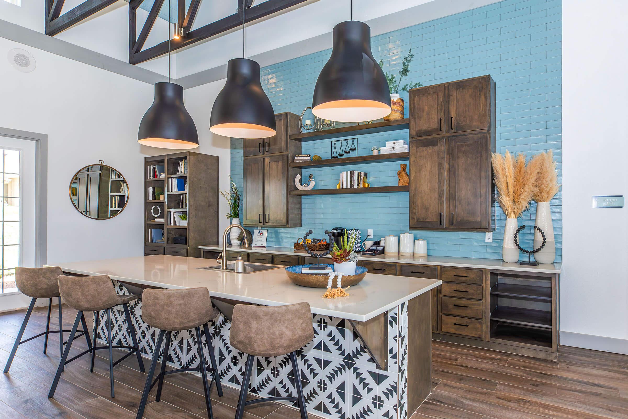 a kitchen with an island in the middle of a room