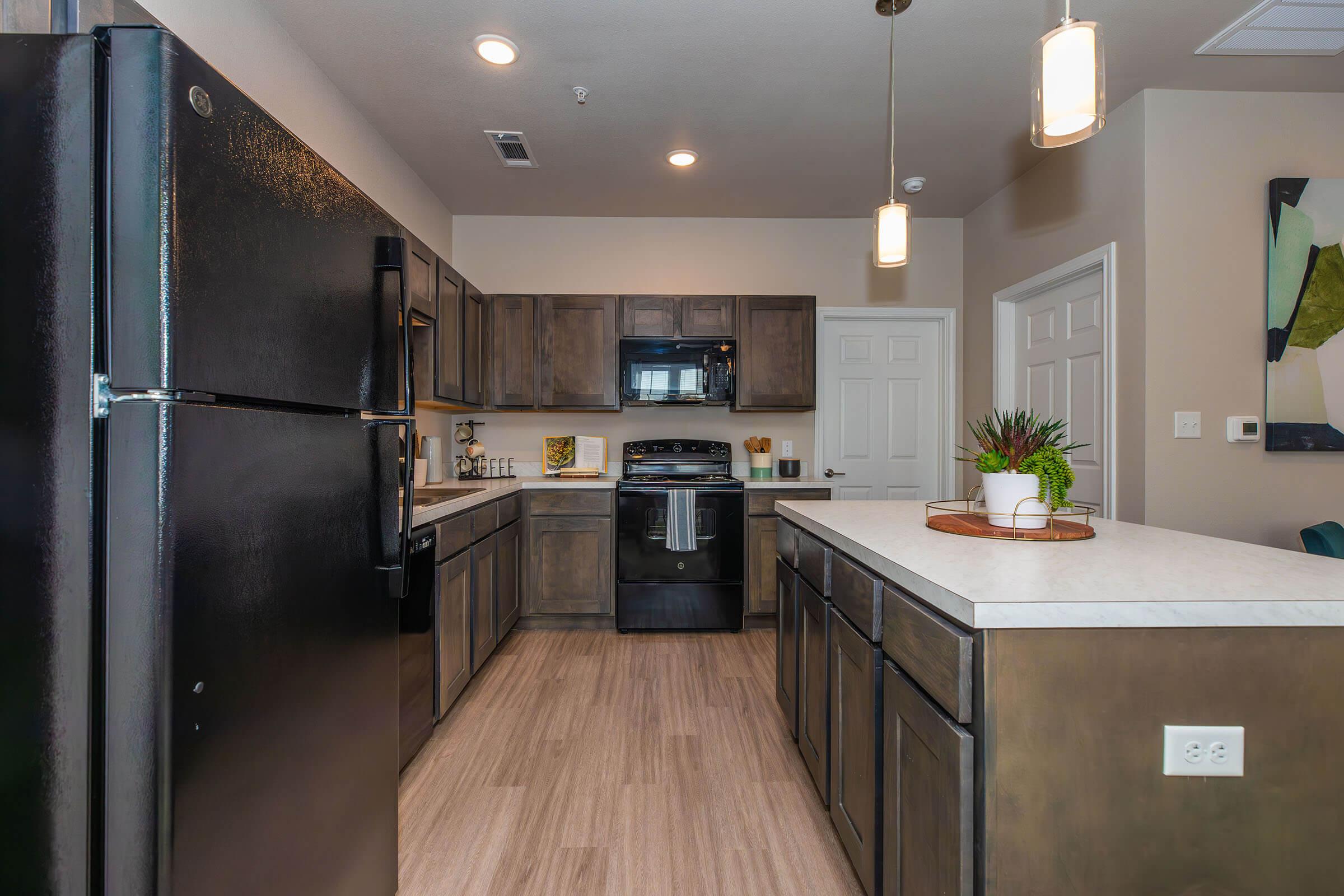 a modern kitchen with stainless steel appliances