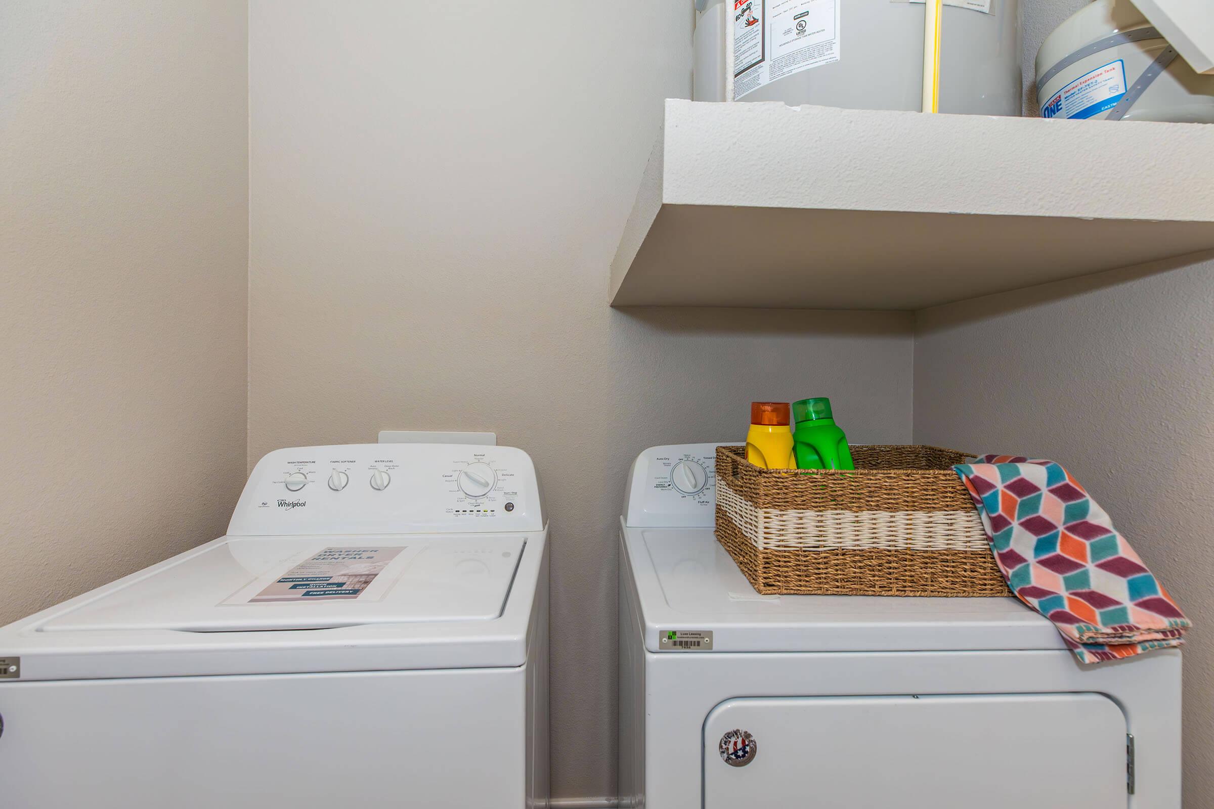 a kitchen with a sink and a refrigerator