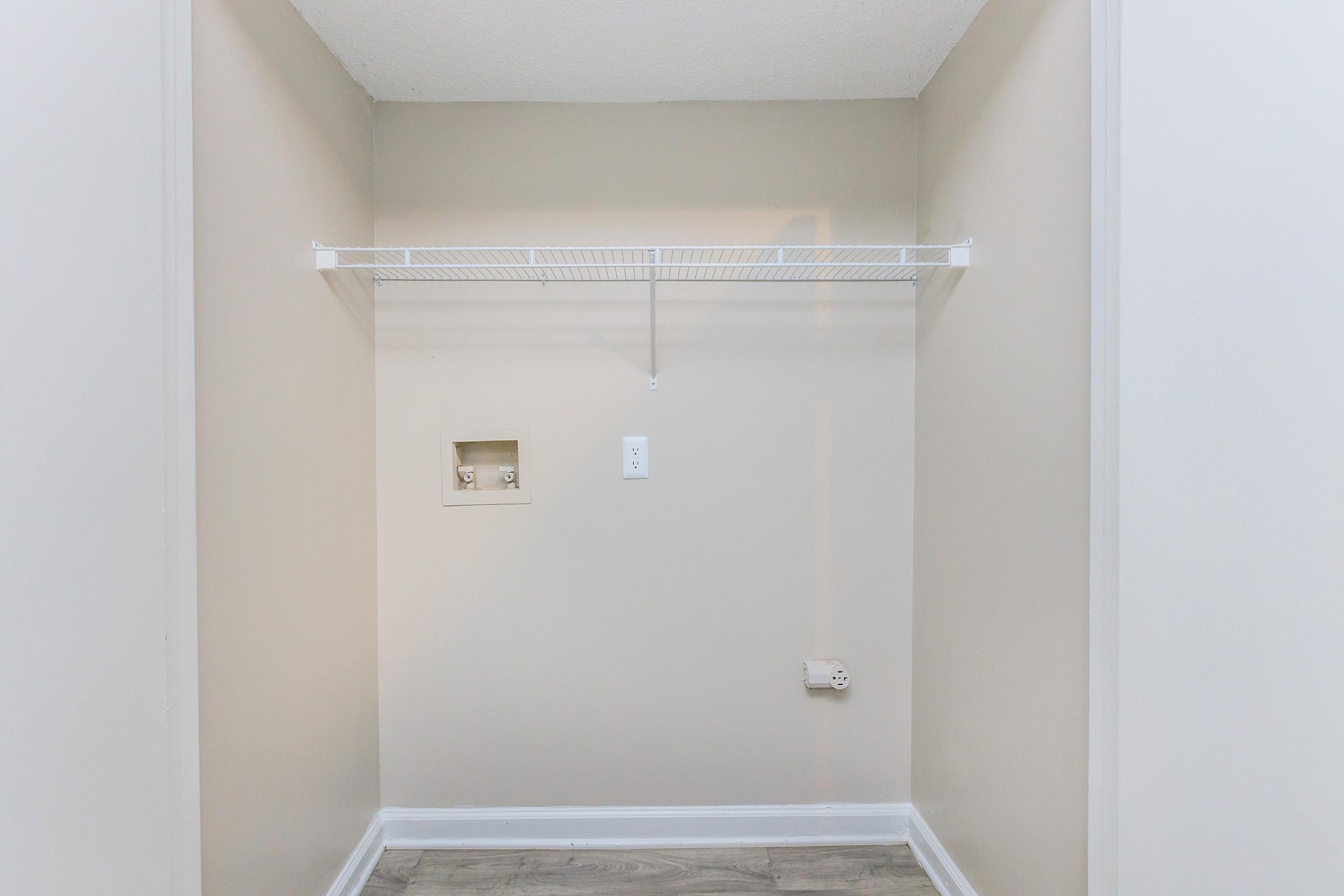 a close up of a shower in a small room