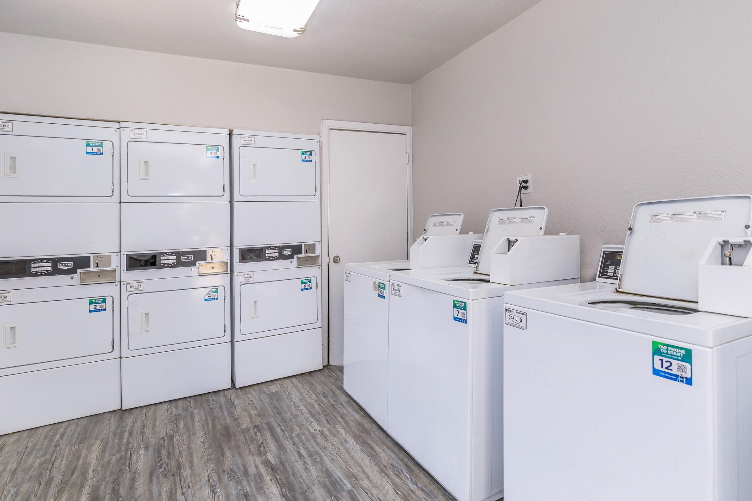 Rise on Cave Creek community laundry facility with washers and dryers