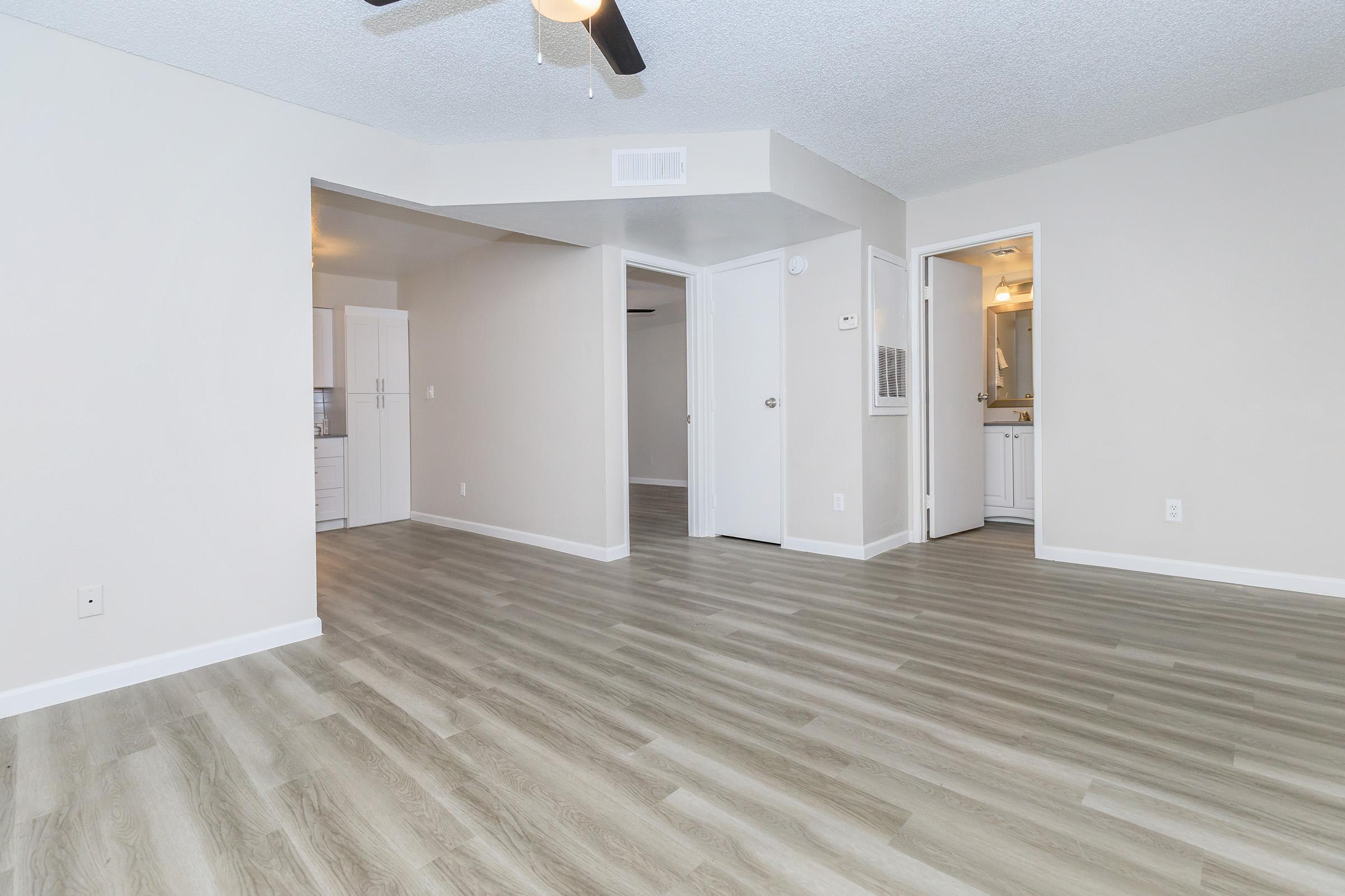 Large white empty and spacious 1-bedroom floorplan at Rise on Cave Creek apartments