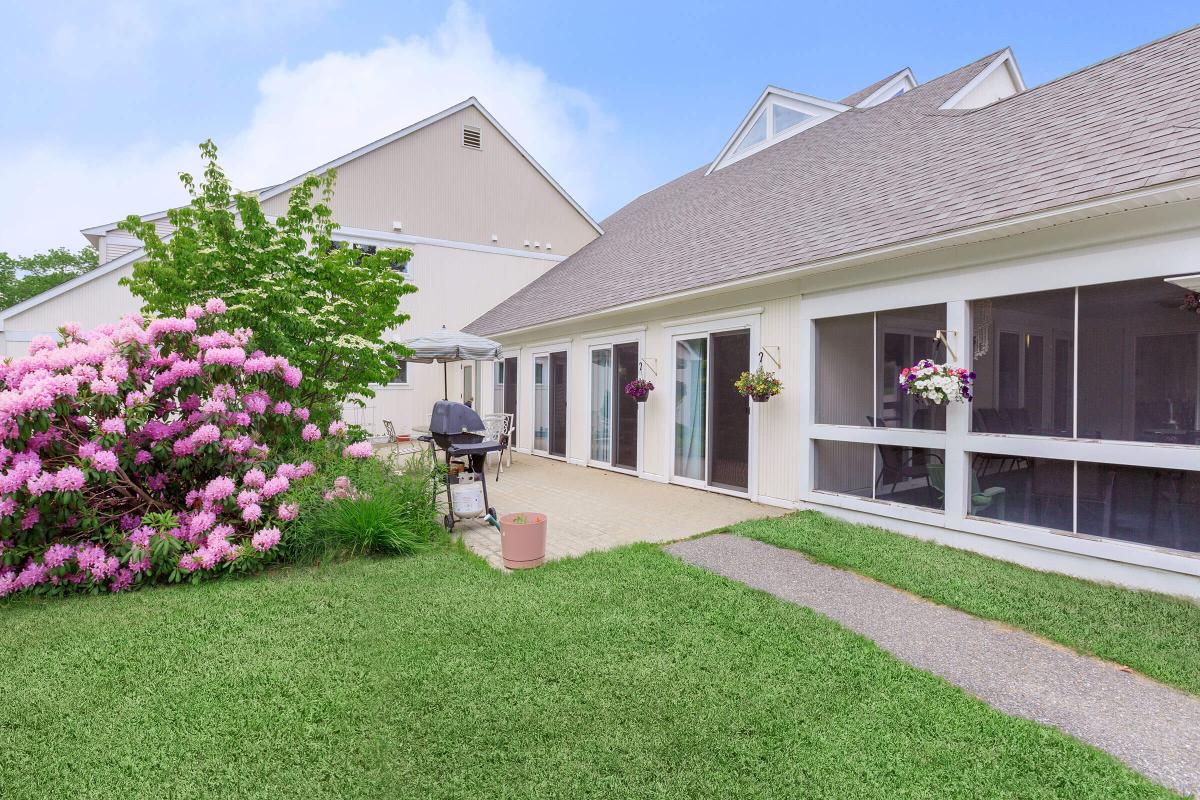 a large lawn in front of a house