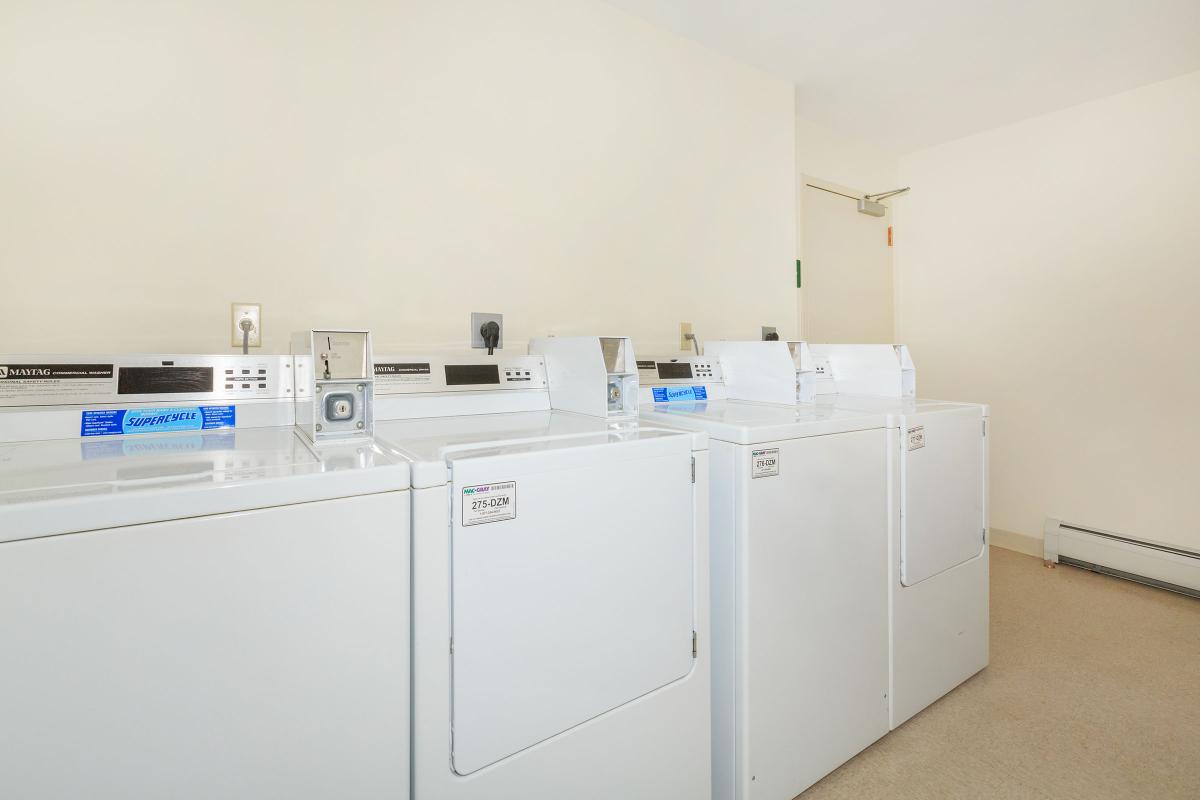 a white refrigerator freezer sitting in a room