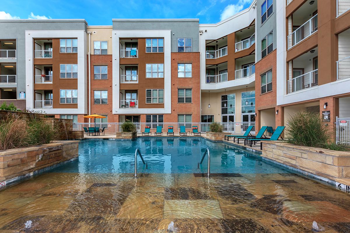 a pool of water in front of a building