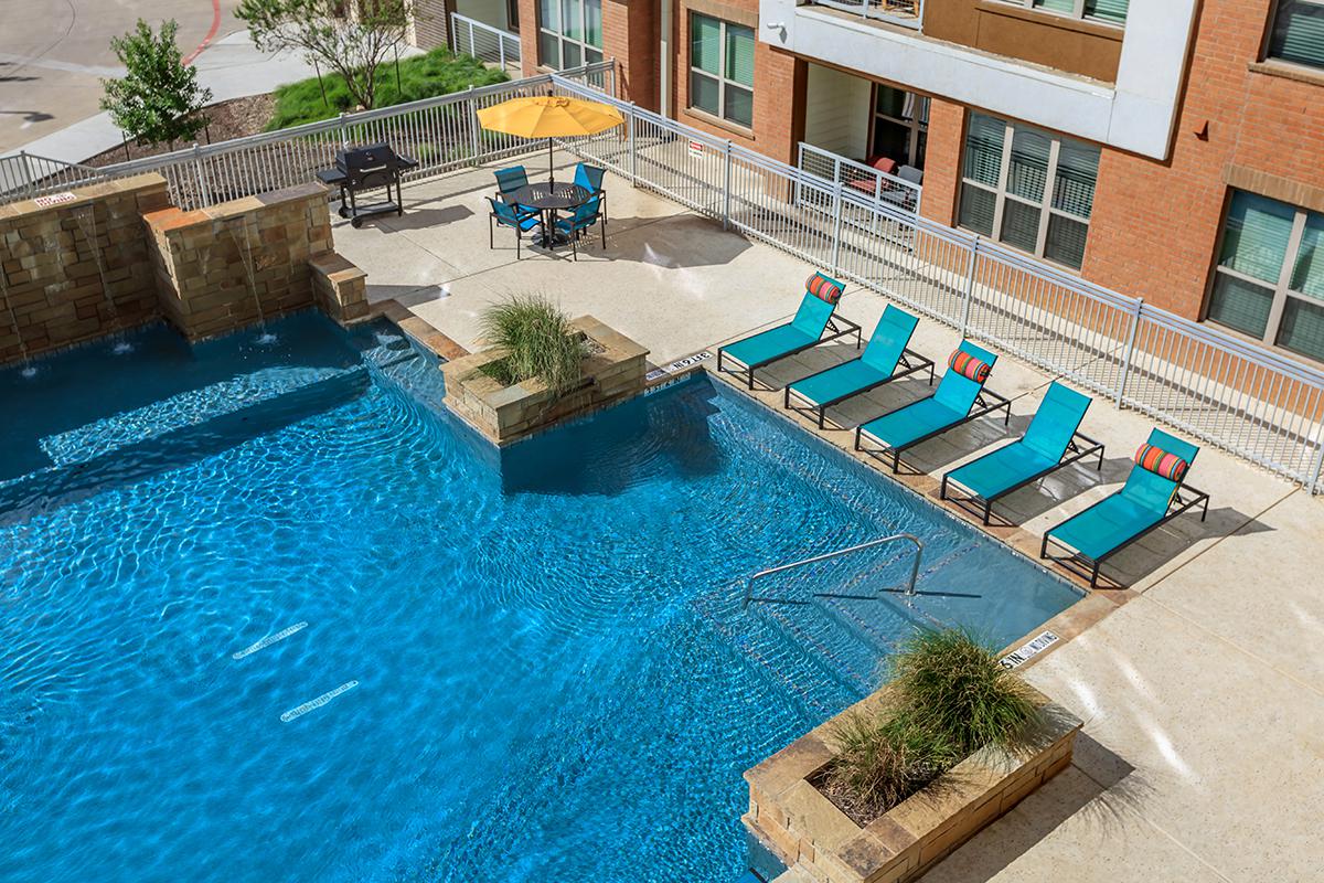 a pool in front of a building