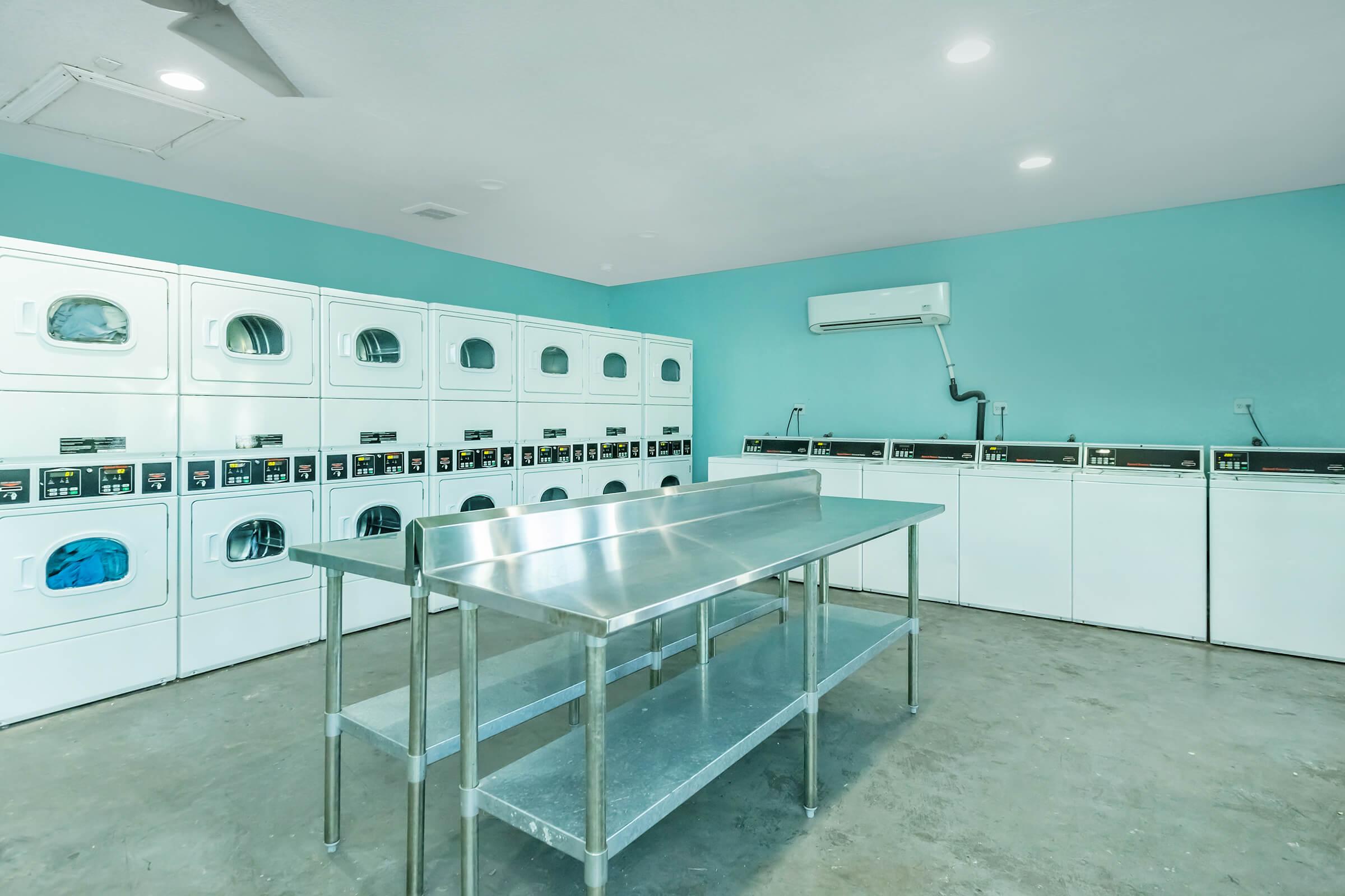 a kitchen with green walls