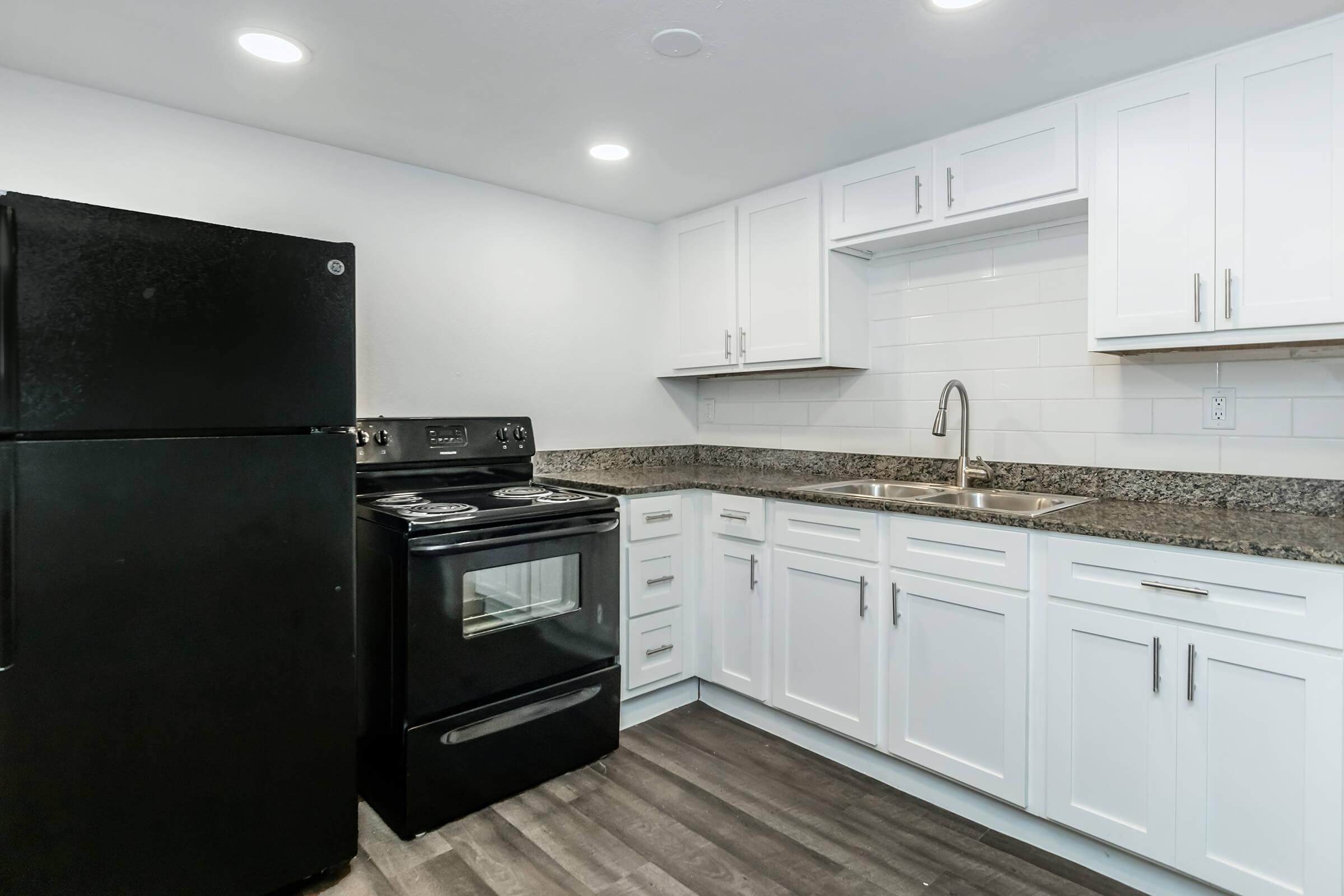 a stainless steel refrigerator in a kitchen