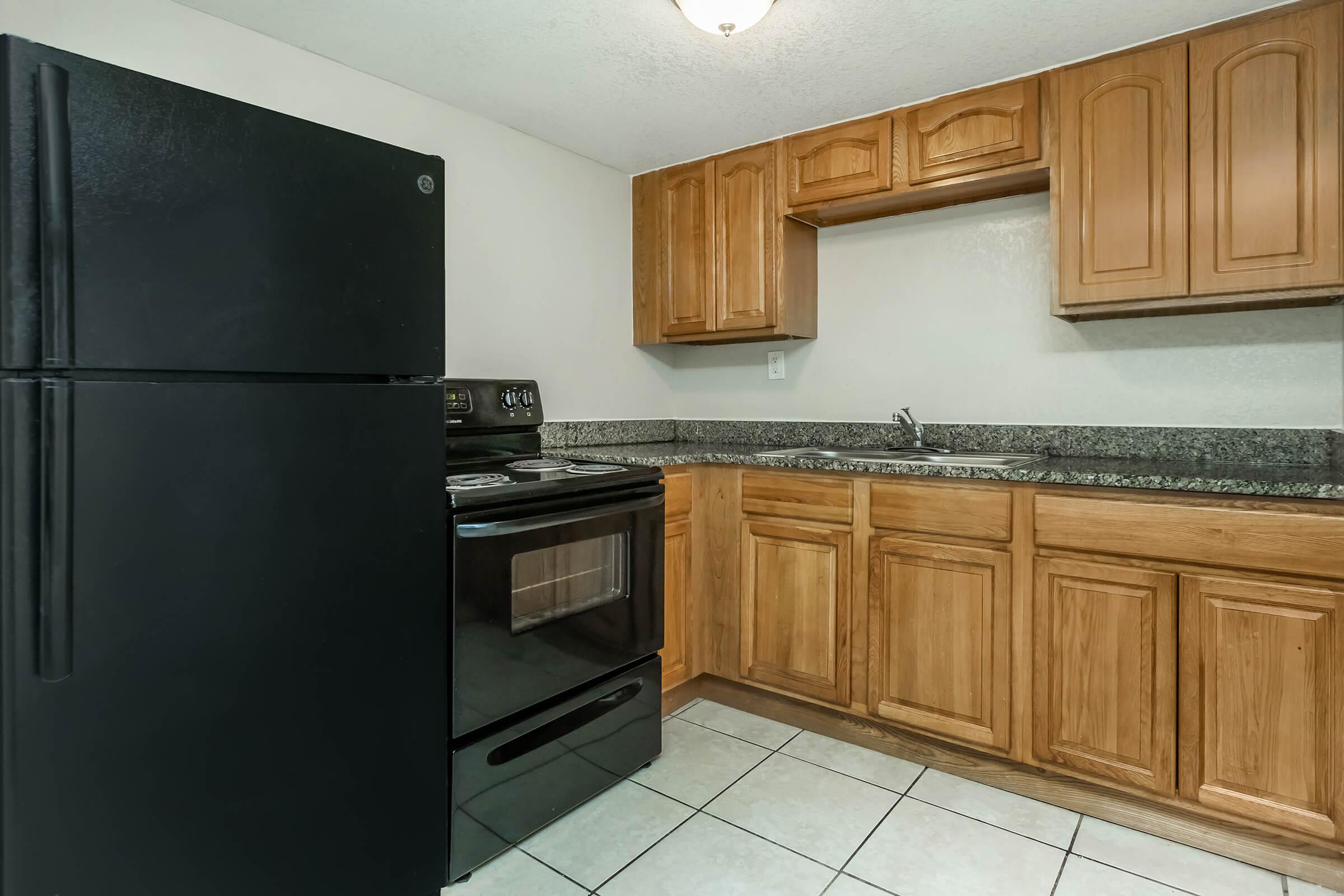 a stainless steel refrigerator in a kitchen