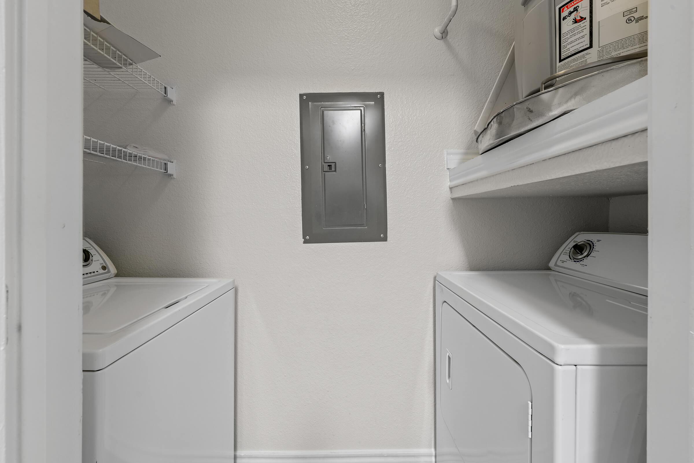 a kitchen with a sink and a refrigerator