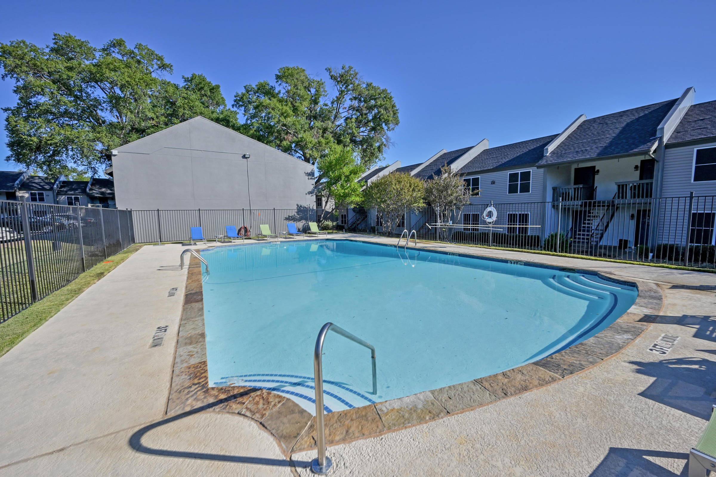 a pool next to a building