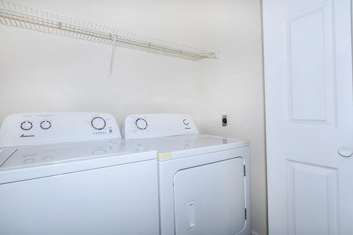 a white refrigerator freezer sitting in a room