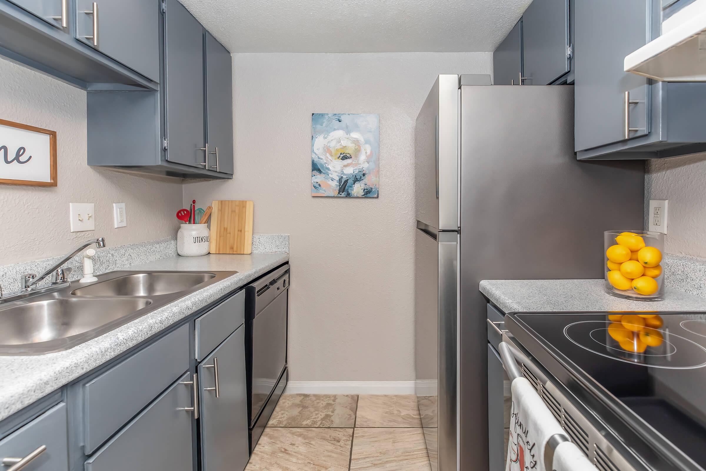 a modern kitchen with stainless steel appliances