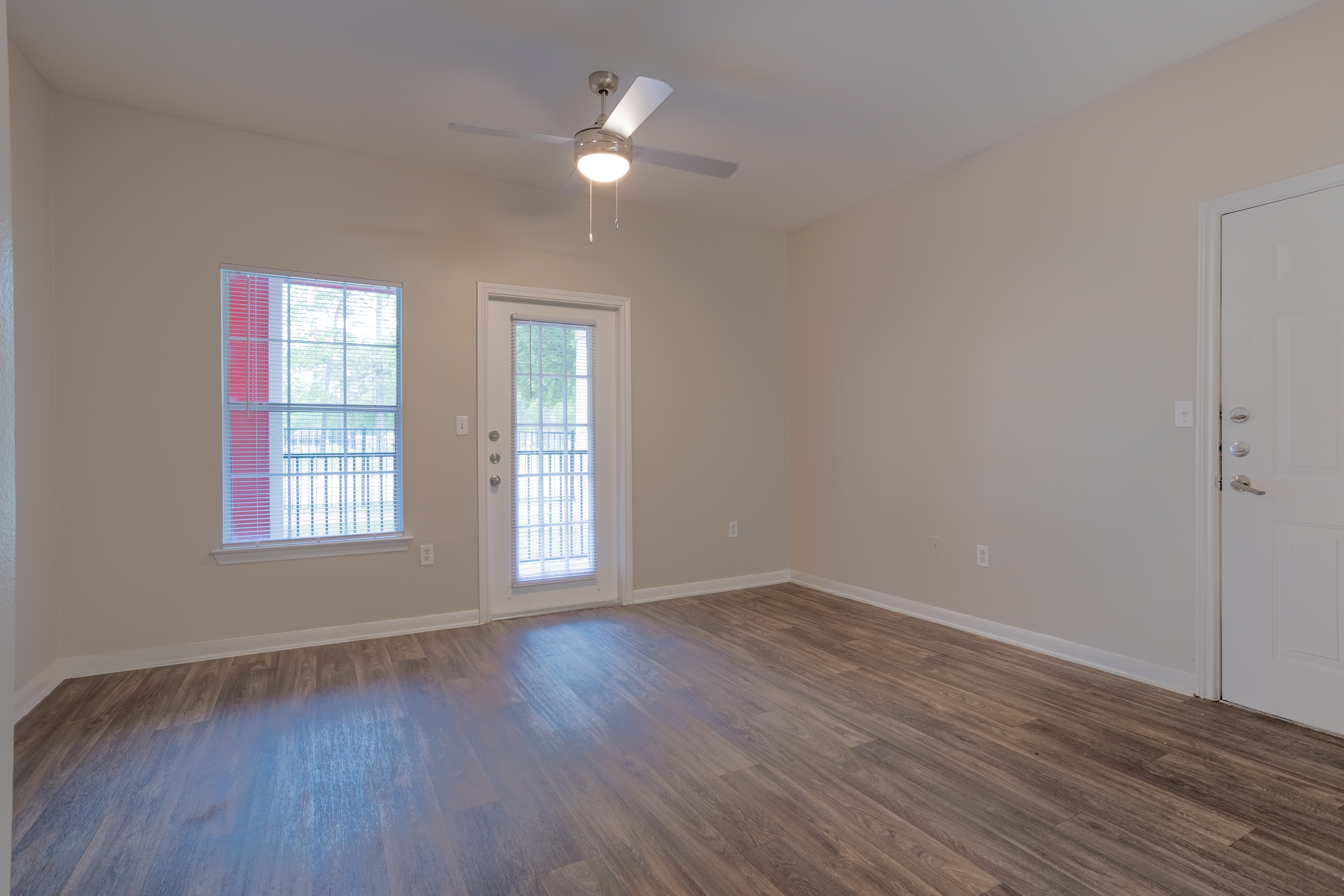 North Forest Trails Apts Houston 1 bedroom apartment living room with ceiling fan