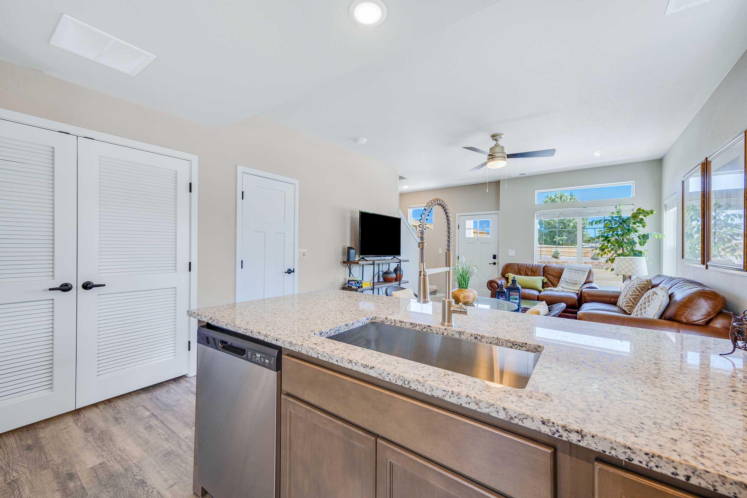 a kitchen with a sink and a window