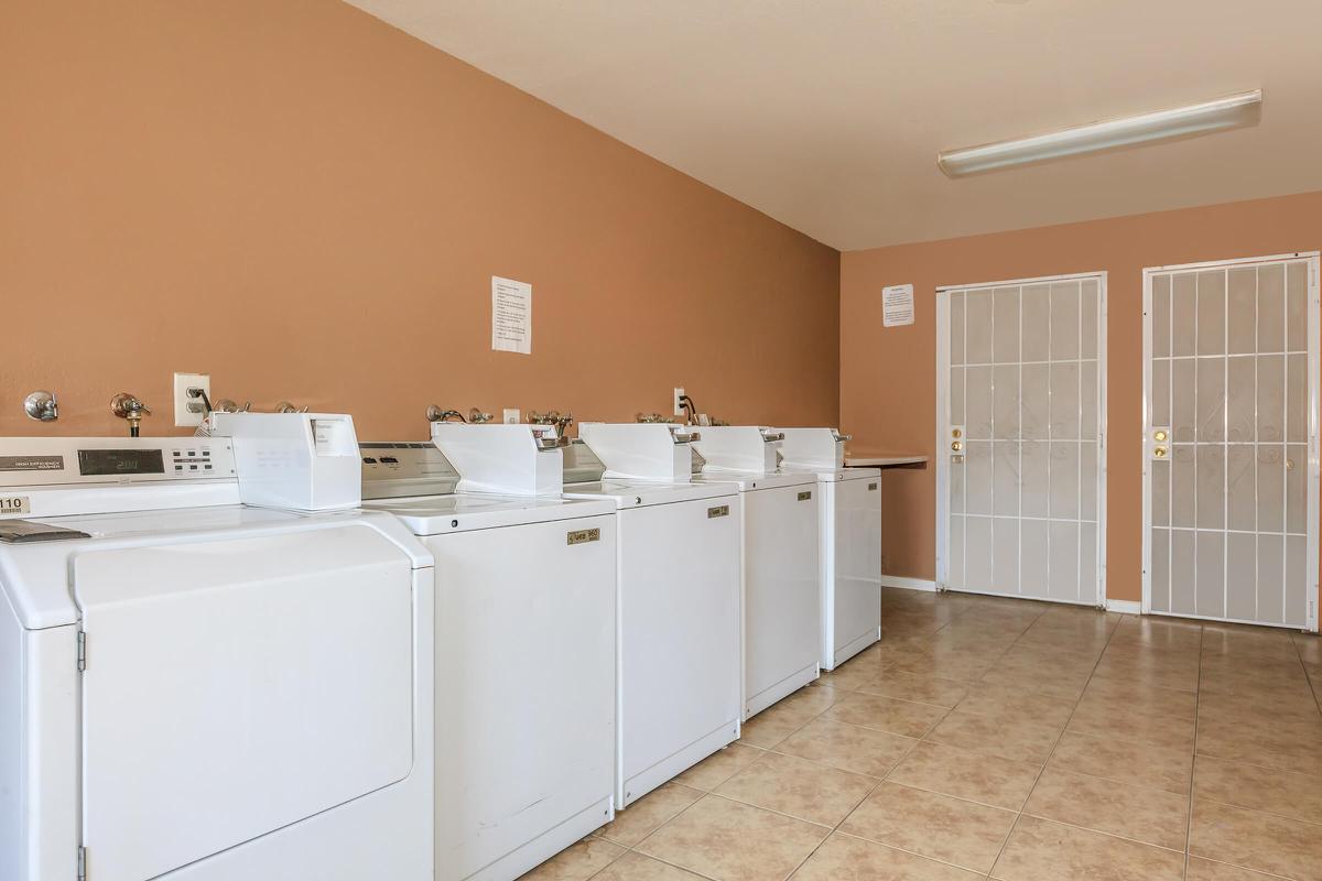 a kitchen with a tile floor