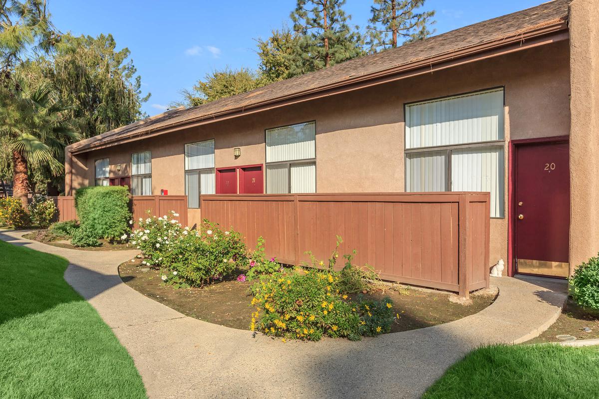 a large lawn in front of a house