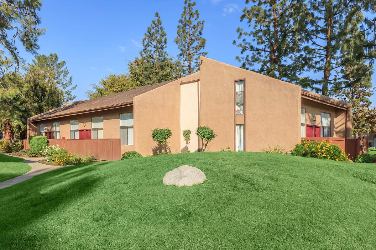 a large lawn in front of a house