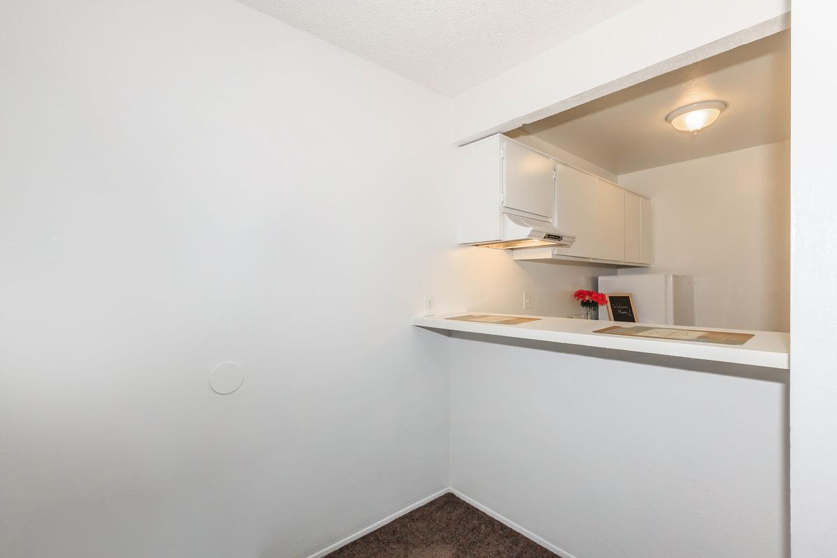 a large white refrigerator in a kitchen