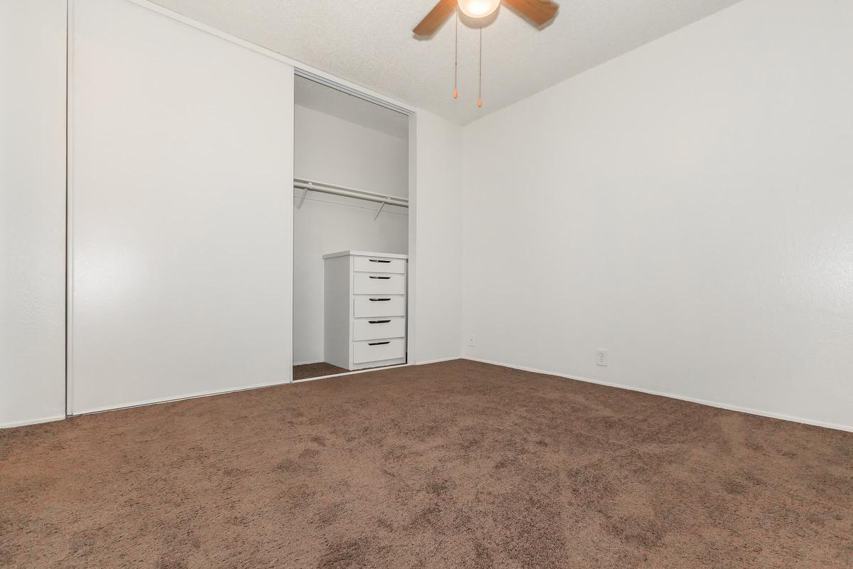 a white refrigerator freezer sitting in a room