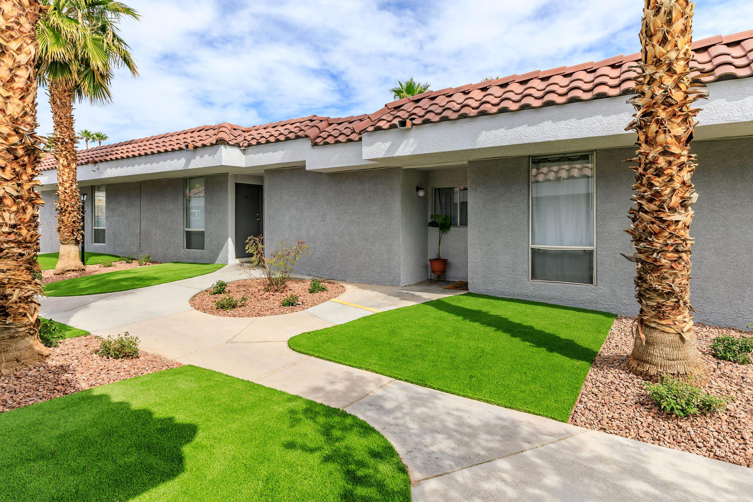 a large lawn in front of a house