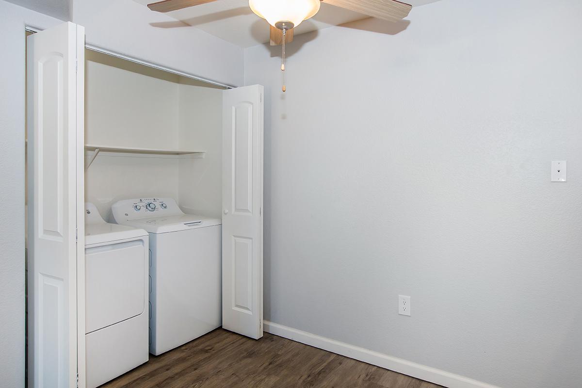 a white refrigerator freezer sitting in a room
