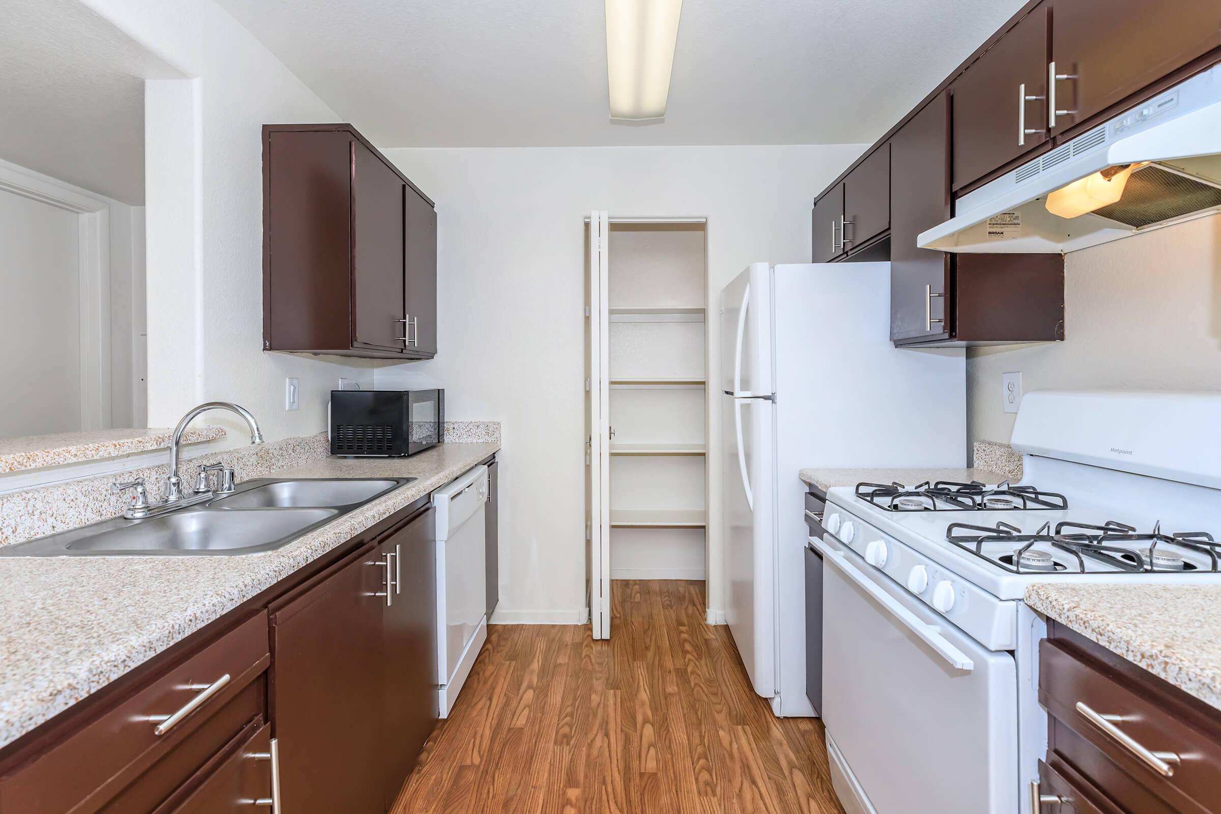 a modern kitchen with stainless steel appliances
