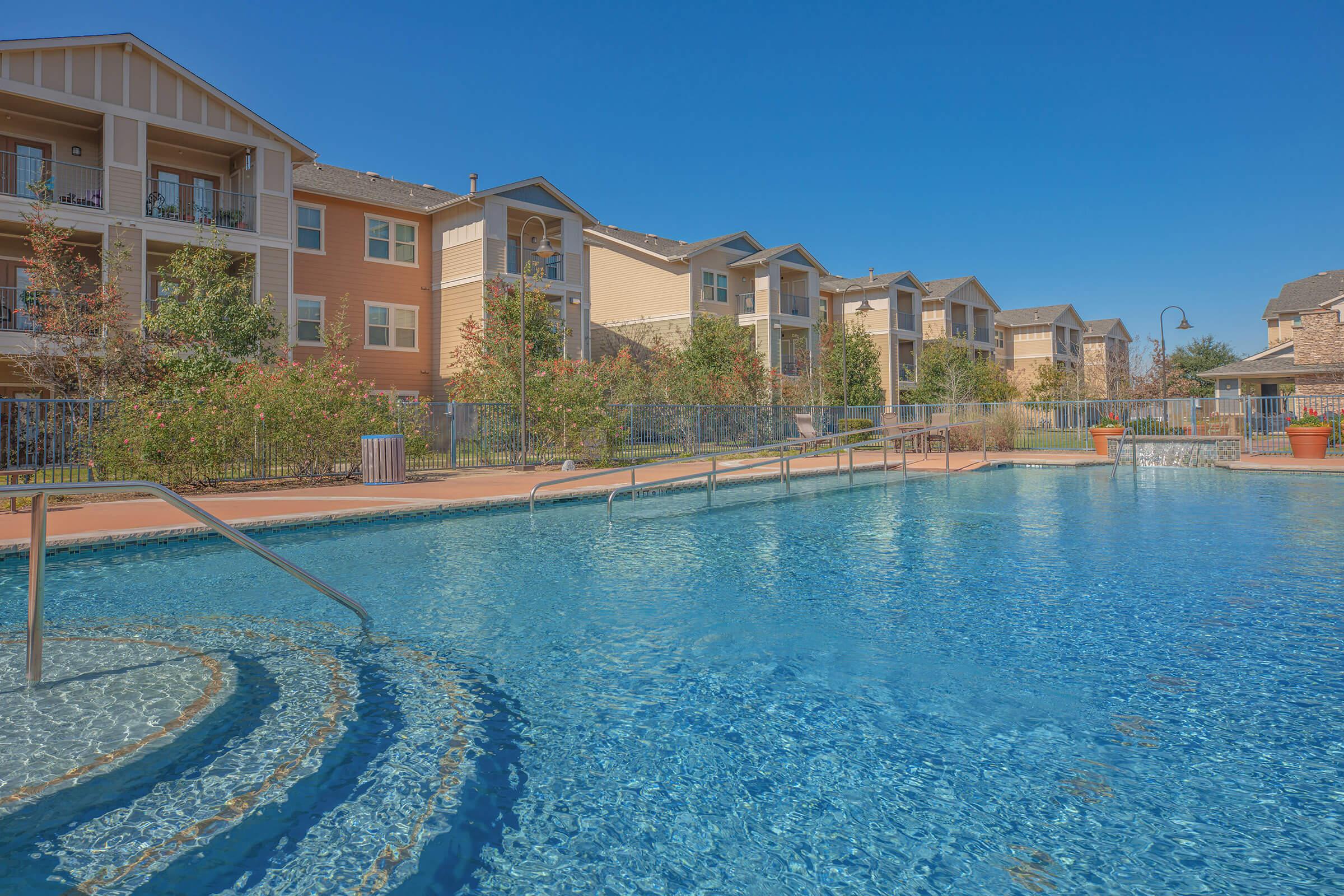 a pool of water in front of a building