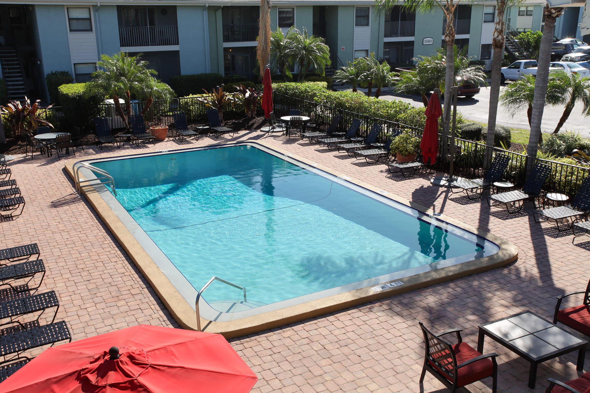 a pool next to a building