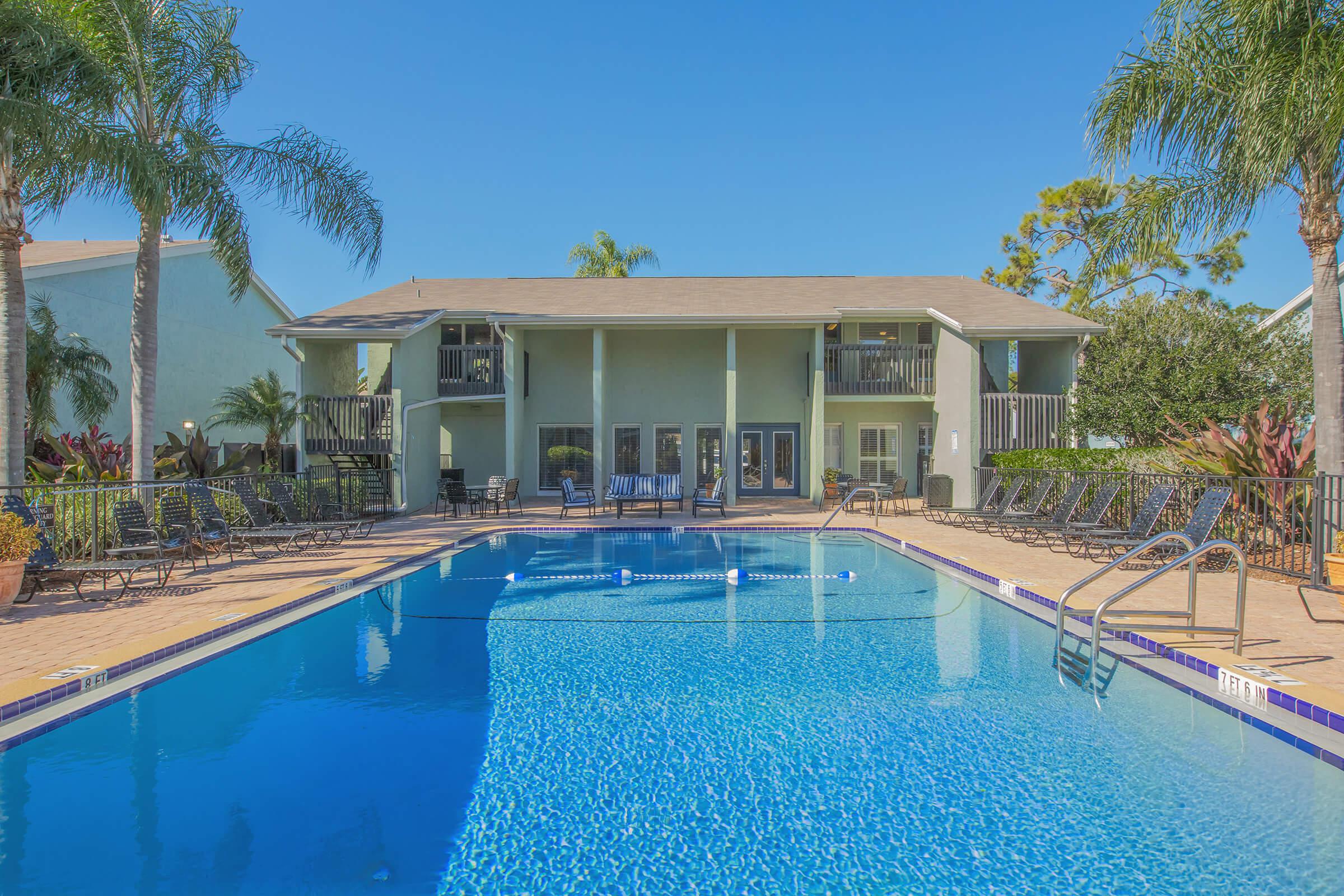 a house with a large pool of water