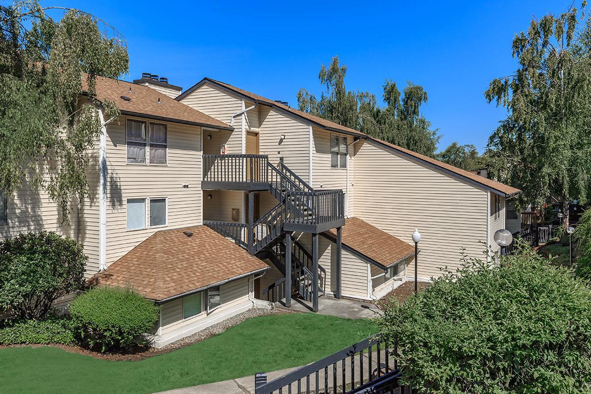 a house with trees in the background