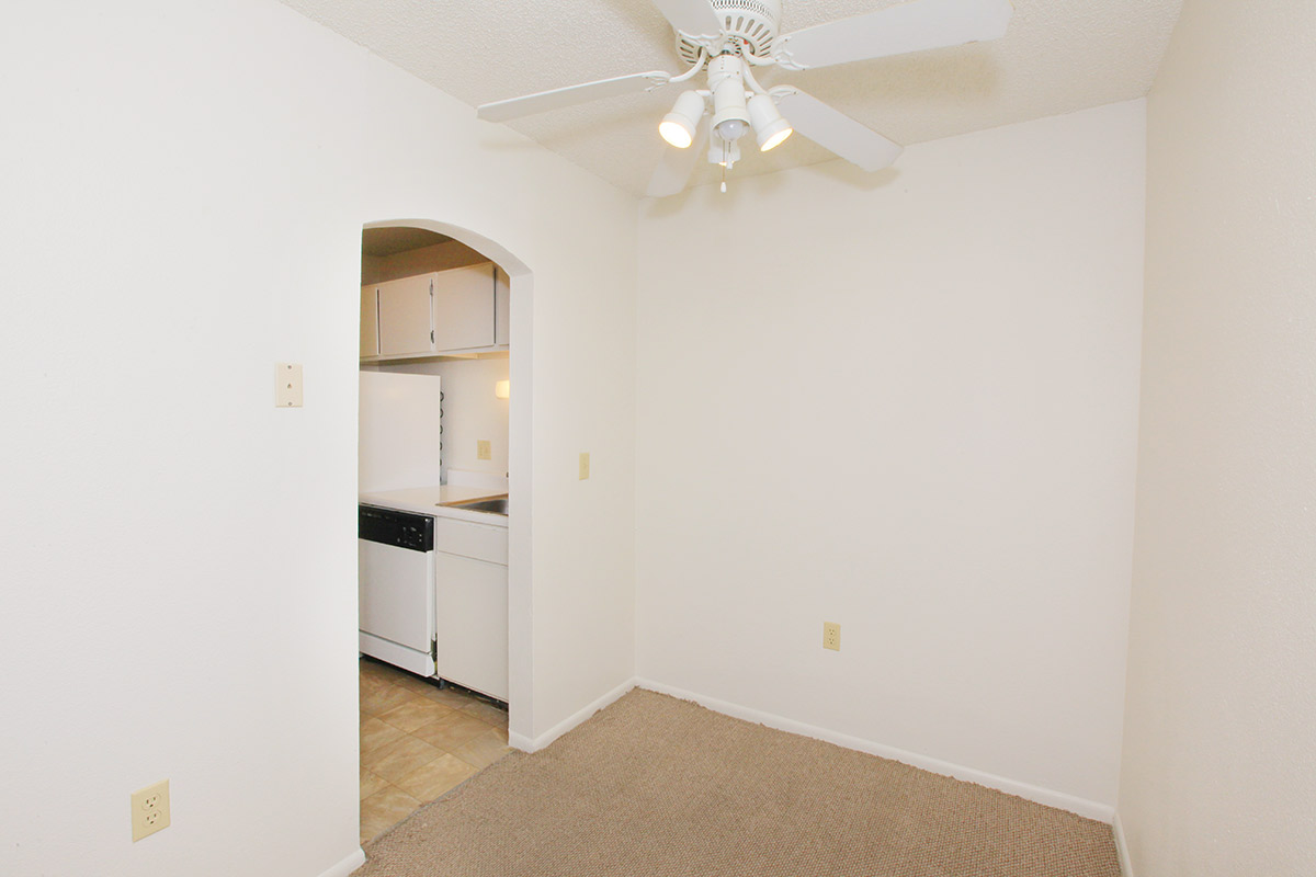 a white refrigerator freezer sitting in a room