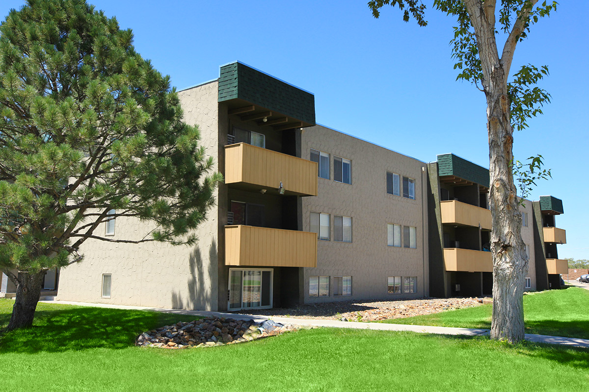 a large lawn in front of a building