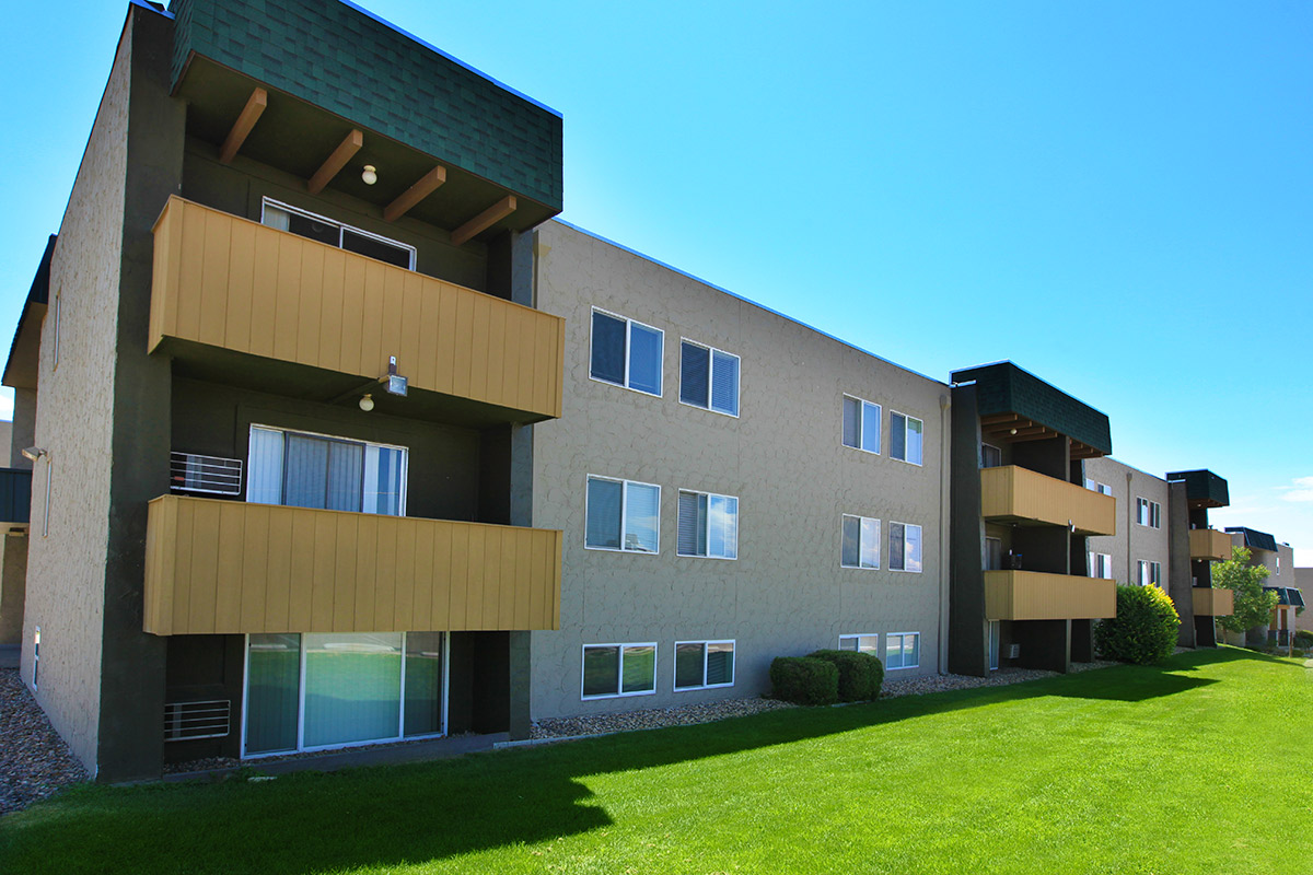 a large lawn in front of a building