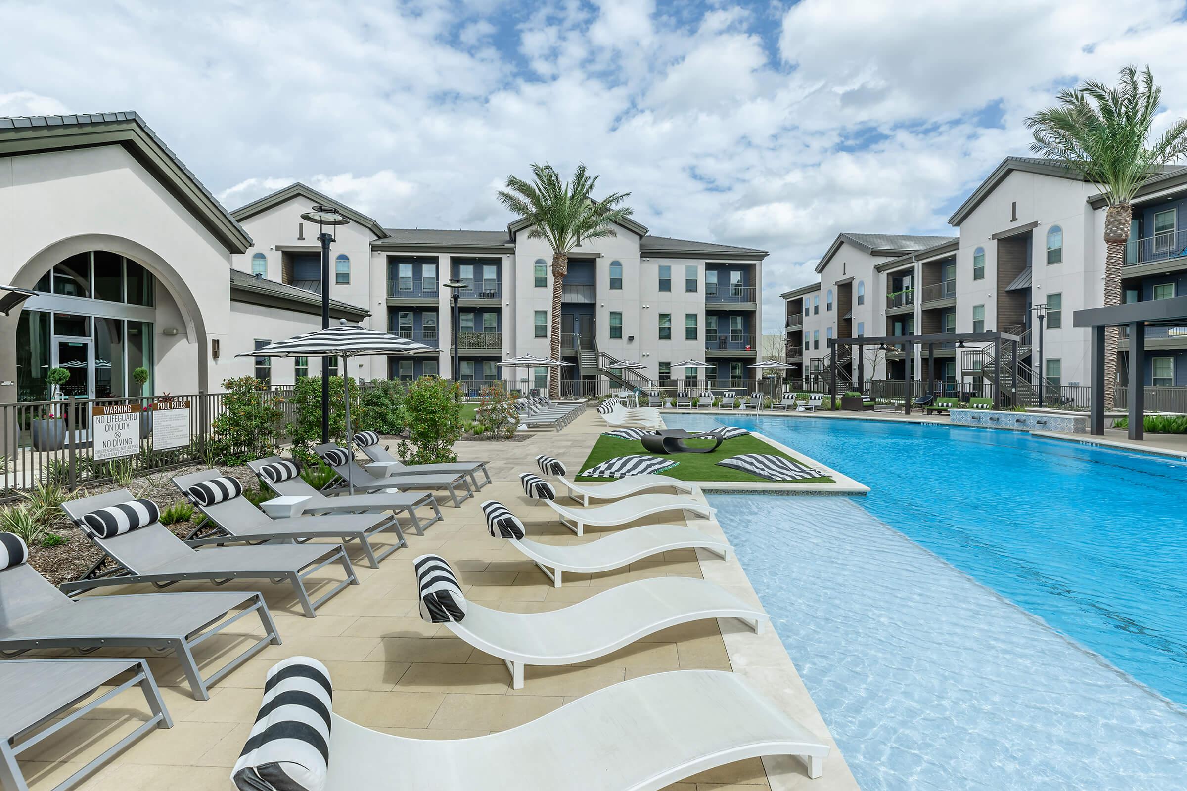 a pool next to a building