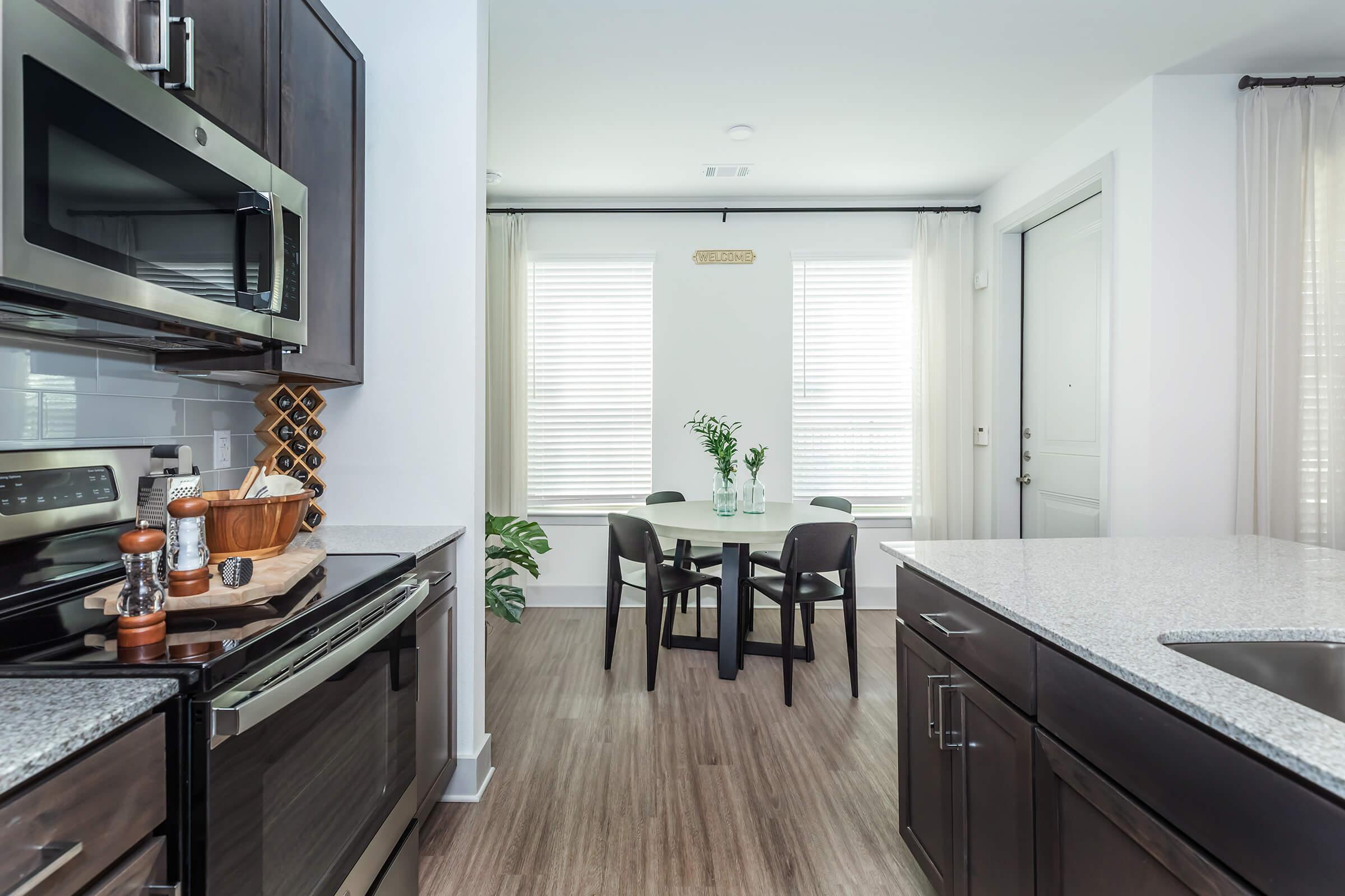 a kitchen with a sink and a window