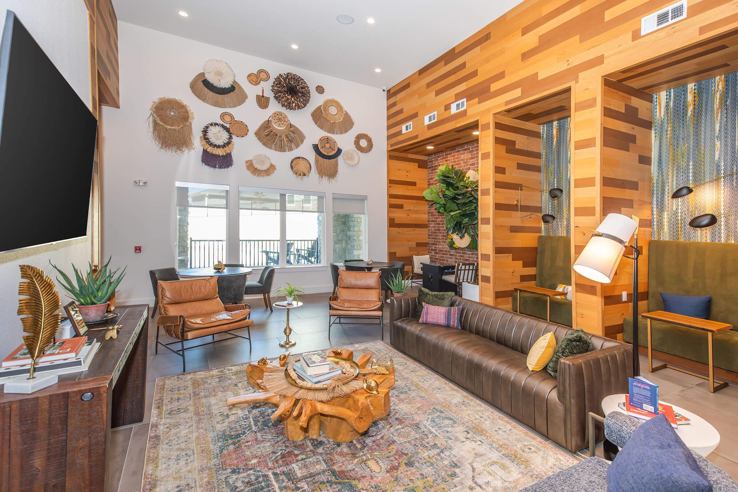 a living room filled with furniture and a fire place