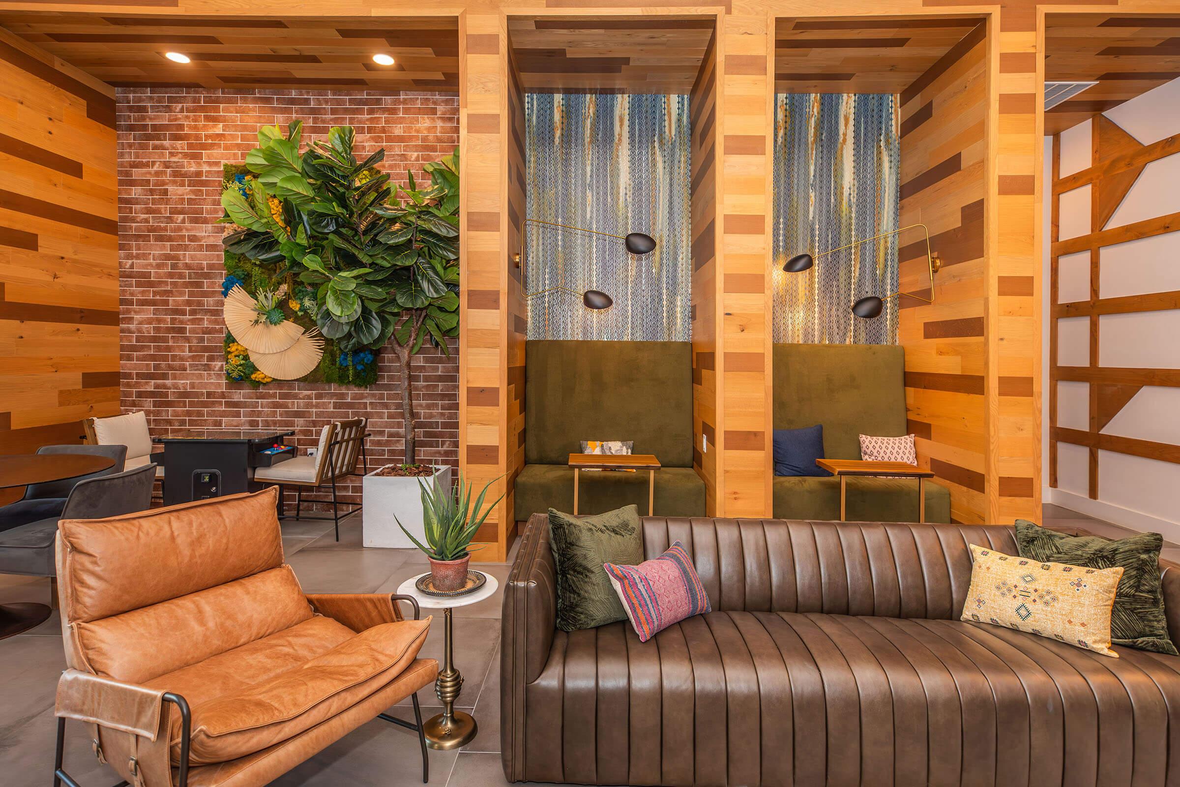 a living room filled with furniture and a fireplace