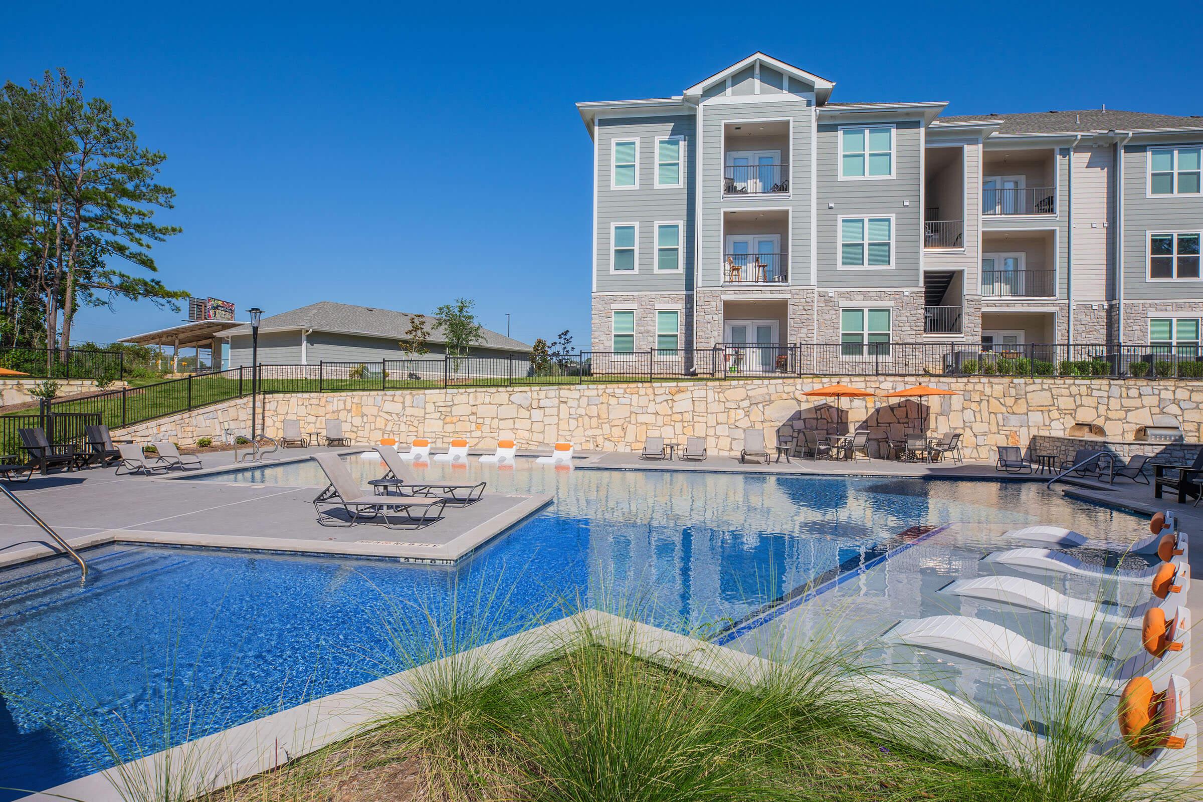 a pool next to a building