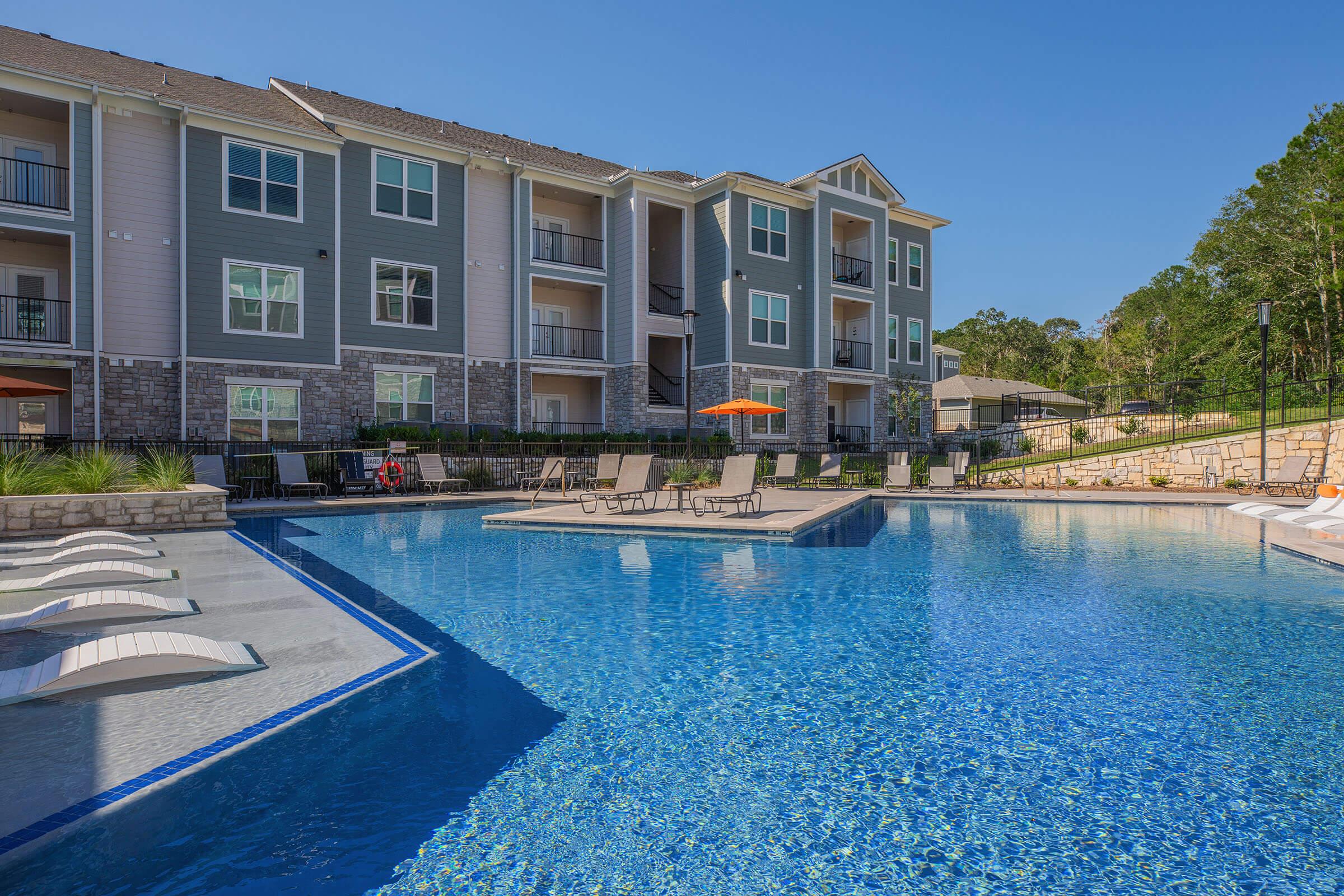 a pool of water in front of a building