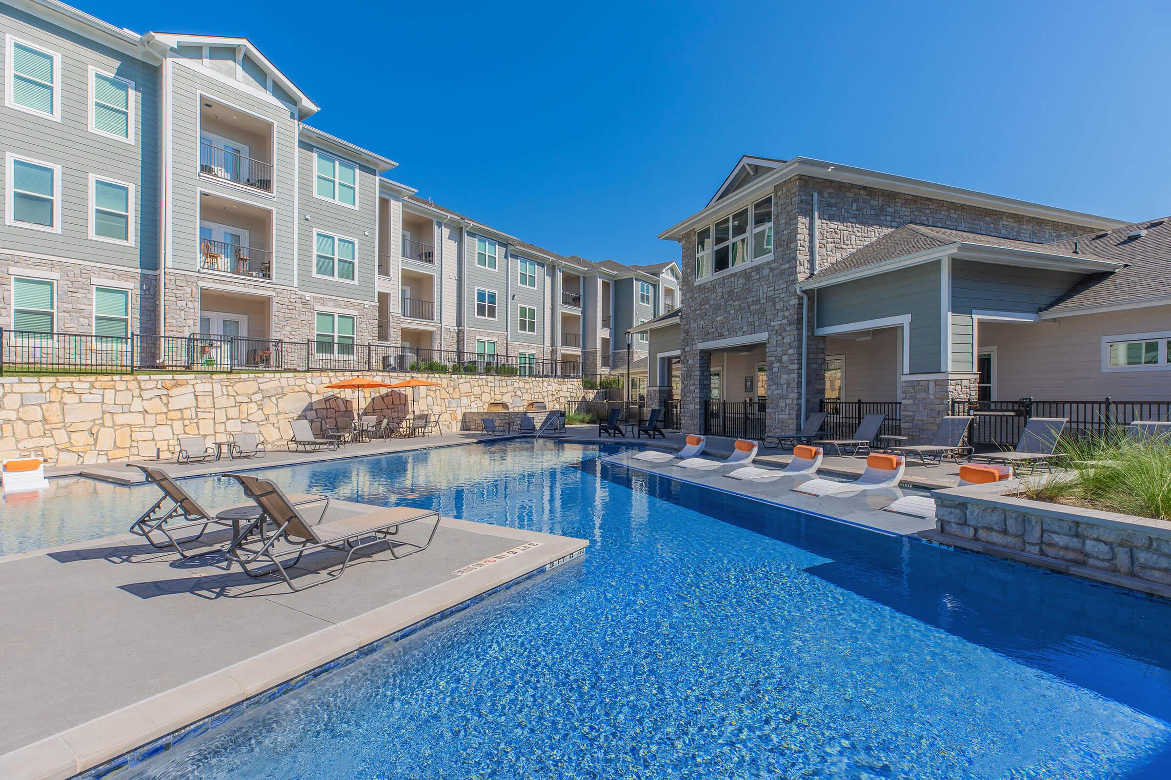 a pool next to a building