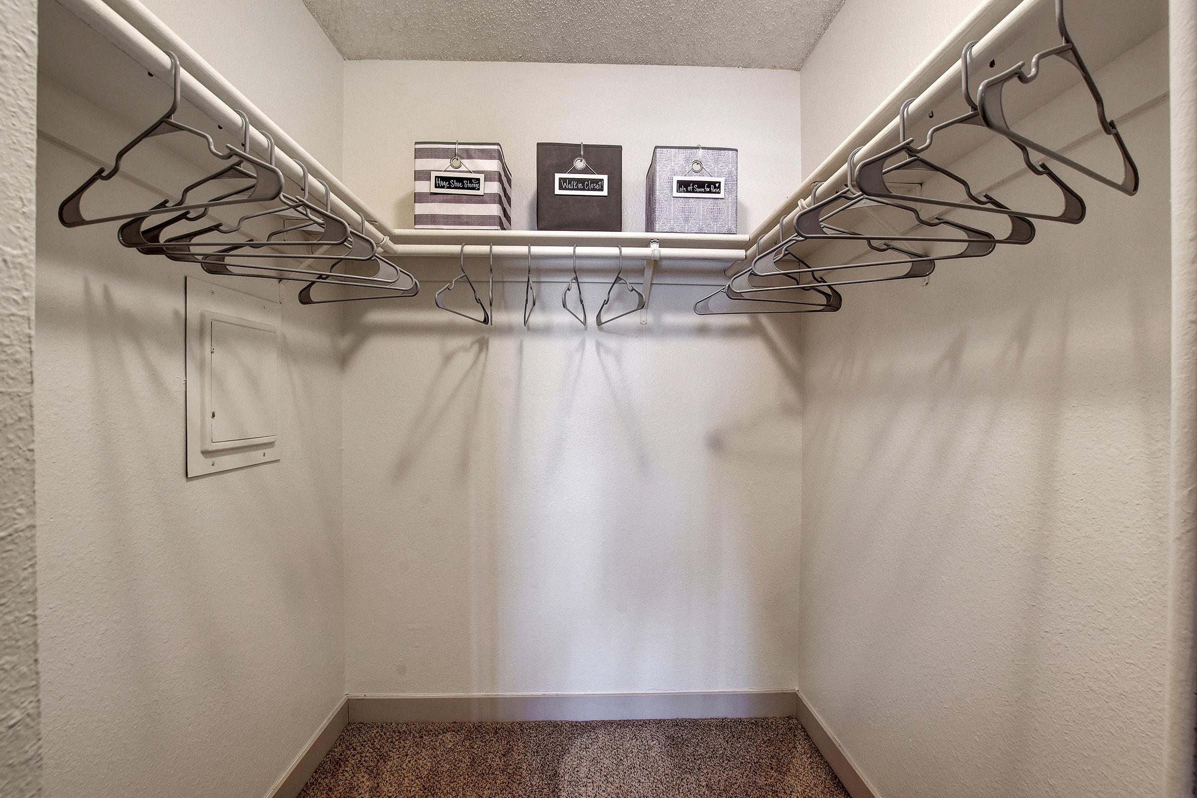 a kitchen with a sink and a mirror